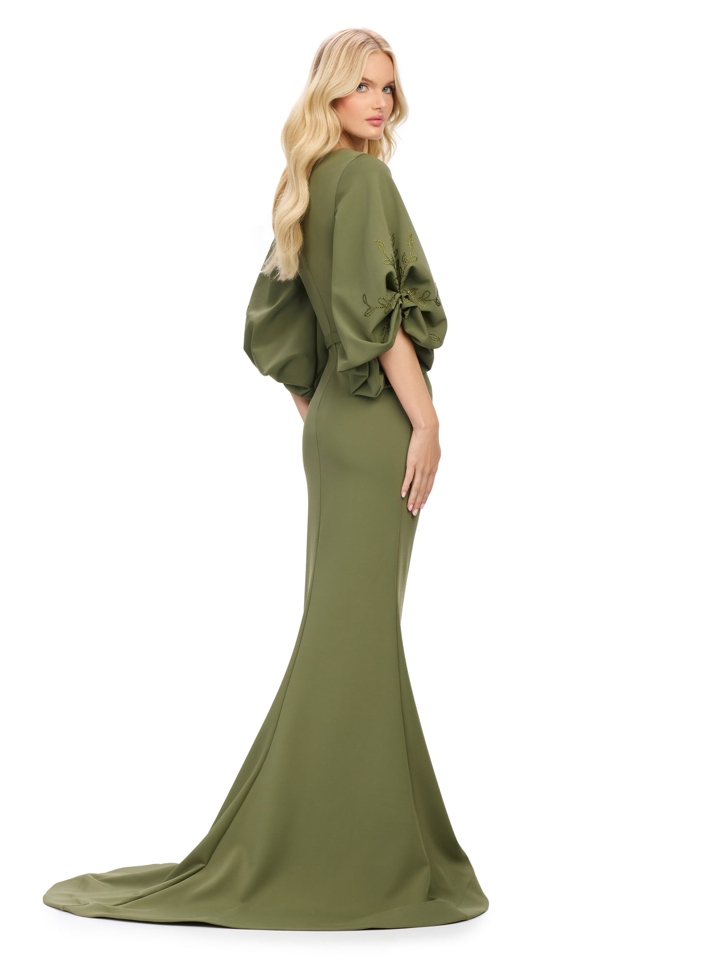 Elevate your evening look with the stunning Ashley Lauren 11740 Long Gathered Sleeves Evening Gown. The scuba fabric provides a sleek and comfortable fit, while the belted waistline accentuates your figure. The gathered sleeves add an elegant touch to this chic gown, making it perfect for any special occasion.