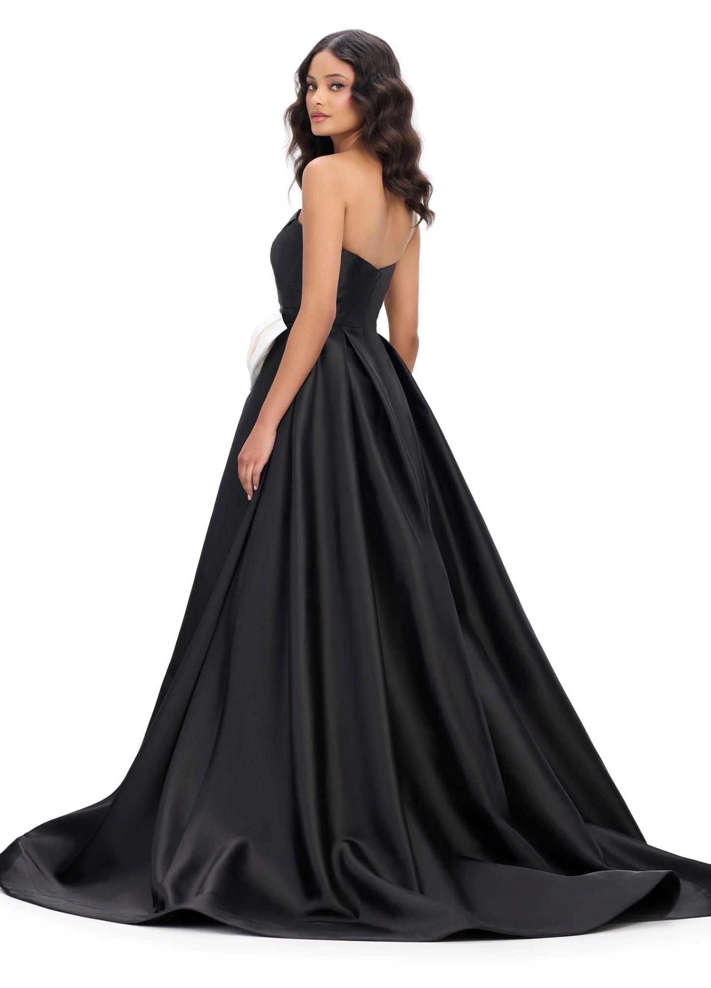 Expertly designed by Ashley Lauren, style 11770 strapless ballgown features a beautiful bow detail and sweetheart neckline. The perfect combination of elegance and style, this dress is a must-have for any formal occasion. Crafted with precision and attention to detail, it's sure to make you stand out.