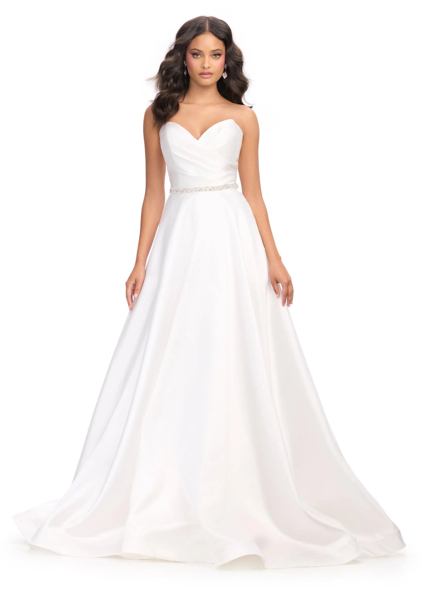 Elegant and sophisticated, the Ashley Lauren 11773 Strapless Ballgown is perfect for any formal occasion. The ruched bodice and crystal belt add subtle details, while the strapless design allows for comfortable wear. Made with high quality materials, this dress is sure to make a statement.