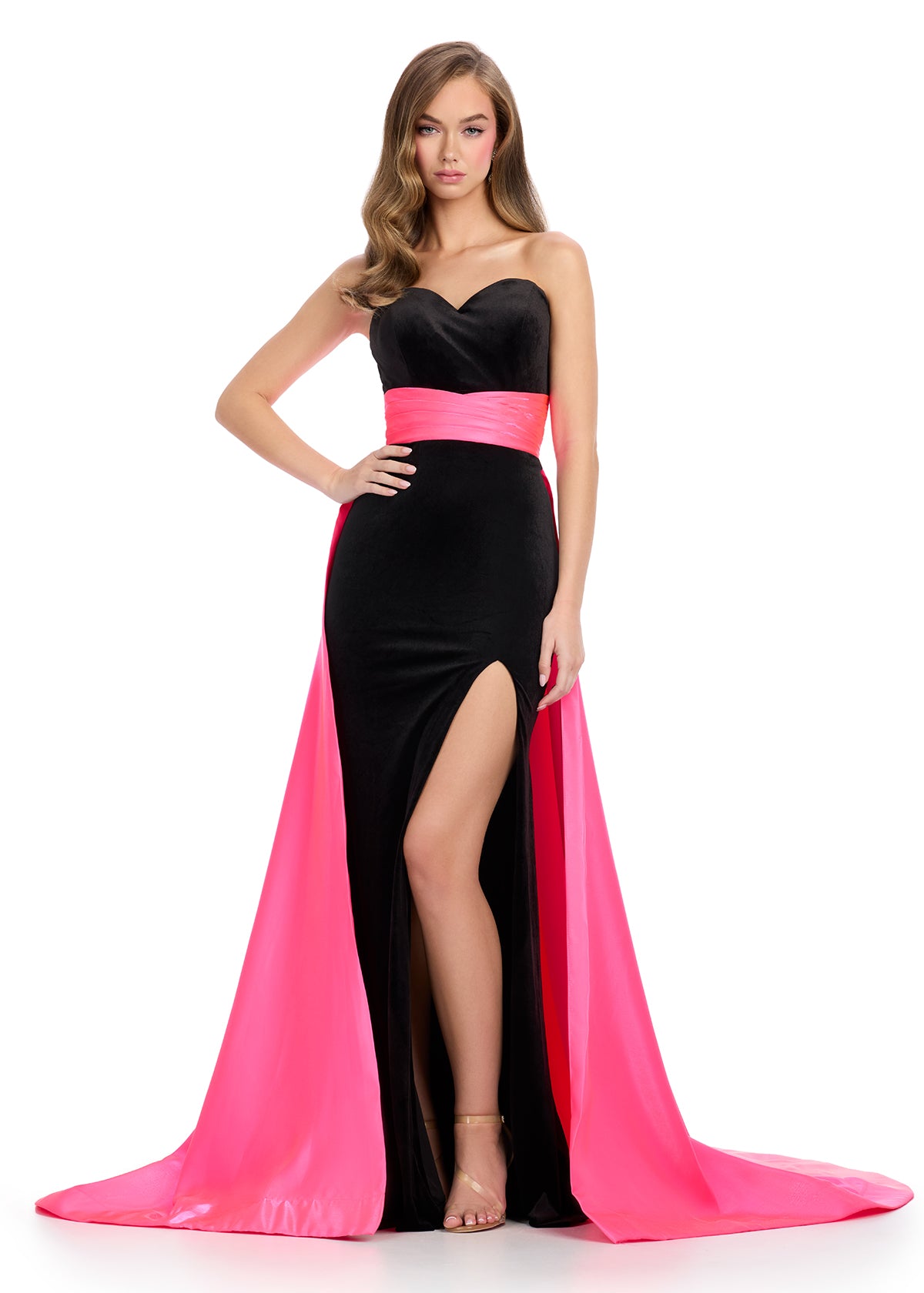 Elevate your formal wear with the Ashley Lauren 11857 Long Fitted Velvet Pageant Dress. Crafted from luxurious velvet, this gown is tailored to accentuate your figure. The elegant satin overskirt adds a touch of sophistication, making it perfect for any formal occasion. Make a statement with this stunning evening gown.&nbsp;We are obsessed with this classic strapless velvet dress with a left leg slit. The dress is finished with a gorgeous satin overskirt sinching the waist and oozing elegance.

Strapless Ne