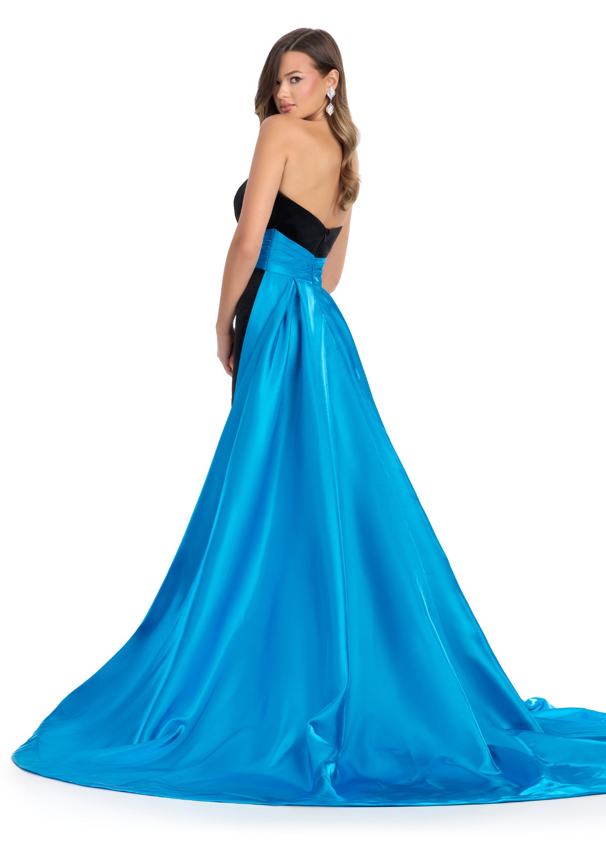 Elevate your formal wear with the Ashley Lauren 11857 Long Fitted Velvet Pageant Dress. Crafted from luxurious velvet, this gown is tailored to accentuate your figure. The elegant satin overskirt adds a touch of sophistication, making it perfect for any formal occasion. Make a statement with this stunning evening gown.&nbsp;We are obsessed with this classic strapless velvet dress with a left leg slit. The dress is finished with a gorgeous satin overskirt sinching the waist and oozing elegance.

Strapless Ne