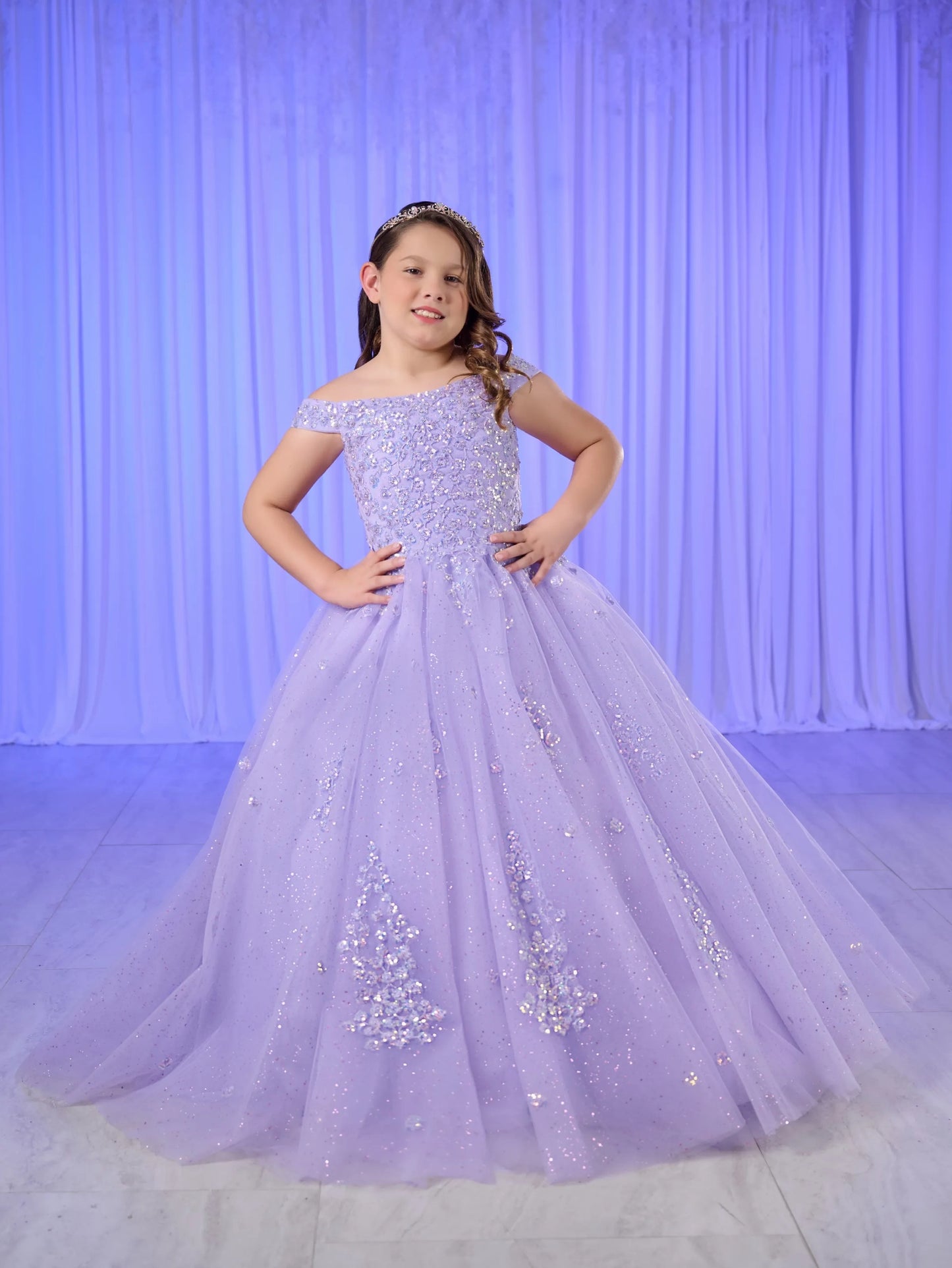 Capture the spotlight in the Tiffany Princess 13764 dress! This stunning pageant dress features an off-the-shoulder design with sequin and shimmer detailing, along with a corset back and sweeping train. Get ready to dazzle the crowd and be the belle of the ball!