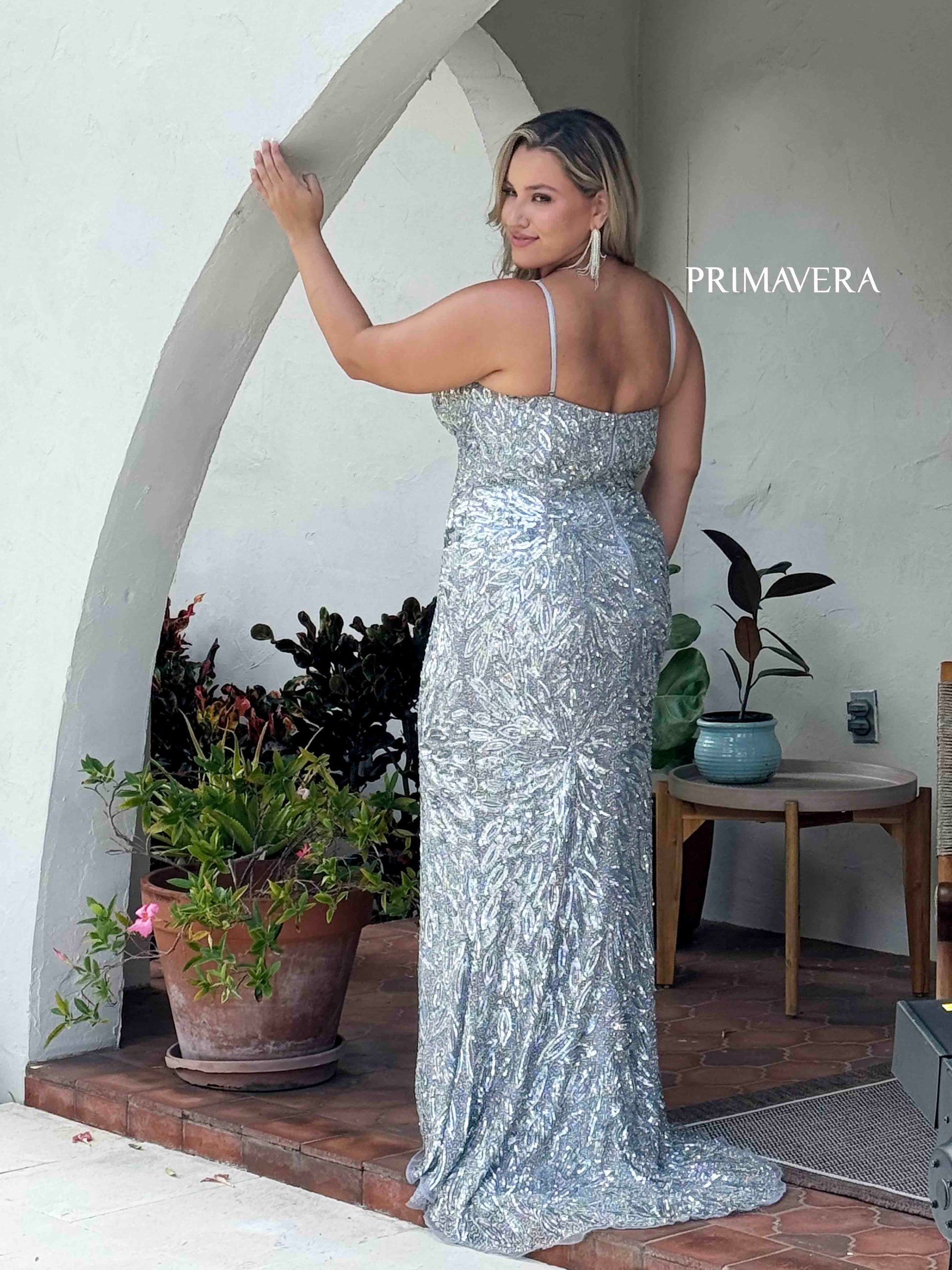 Experience the ultimate in elegance and style with the Primavera Couture 14078 Plus size Sequin Curvy Prom Dress. Featuring a stunning sequined design and a flattering V-neckline, this dress is perfect for a formal evening event. With its curve-hugging fit and luxurious materials, you'll feel confident and glamorous all night long.

Sizes: 14W-24W

Colors: Black, Platinum, Red