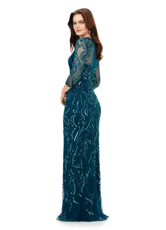 Ashley Lauren 11208 Three Quarter Sleeve Beaded Crew Neckline High Illusion Back Fully Hand Beaded Evening Gown. This gorgeous evening gown has a crew neckline, fitted mesh sleeves and a modern, intricate bead batter throughout. It is perfect for your next event.