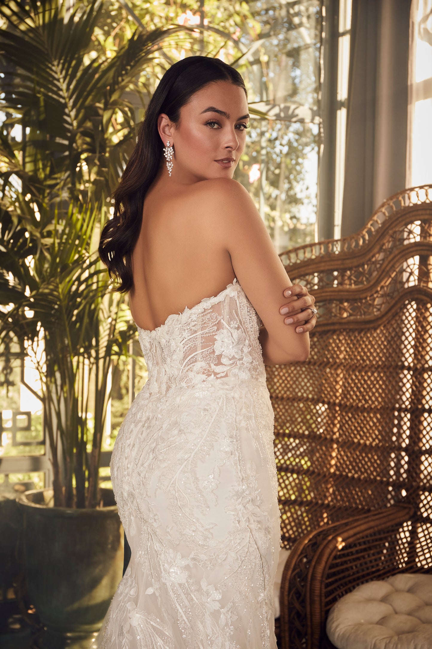 Indulge in luxury and grace with the Casablanca 2477 beaded mermaid wedding dress. The stunning long sleeve, strapless design is embellished with intricate beading, adding a touch of glamour to your special day. The fitted silhouette and elegant train will enhance your natural curves and leave you feeling like a true goddess. Artful and intricate, Style 2477 Delaney by Casablanca Bridal embodies storybook romance. Delicate lace, sequins, and beading sculpt the sweetheart neckline of this strapless fit and f