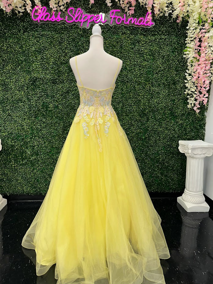 The Johnathan Kayne 2686 A-Line ballgown is perfect for your next special event. This size 4 dress is made with luxurious yellow lace and features stunning studded detailing on the corset. Experience unparalleled elegance and make a statement in this unforgettable ensemble.  Size: 4  Color: Yellow  *ONE OF A KIND