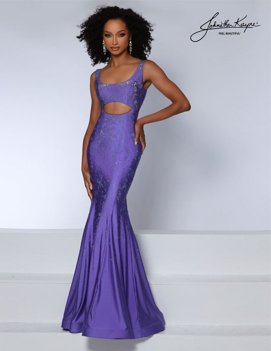 The Johnathan Kayne 2806 Prom Dress is a stunning and sophisticated formal gown. Its scoop neck bodice and mermaid silhouette create a timeless and graceful look. The delicate cutouts keep this classic look modern and chic. Enjoy partying in style this season with this amazing formal gown. Dazzle and mesmerize! This 4 Way Stretch Lycra gown features a bodice cutout that is designed to leave a lasting impression. 