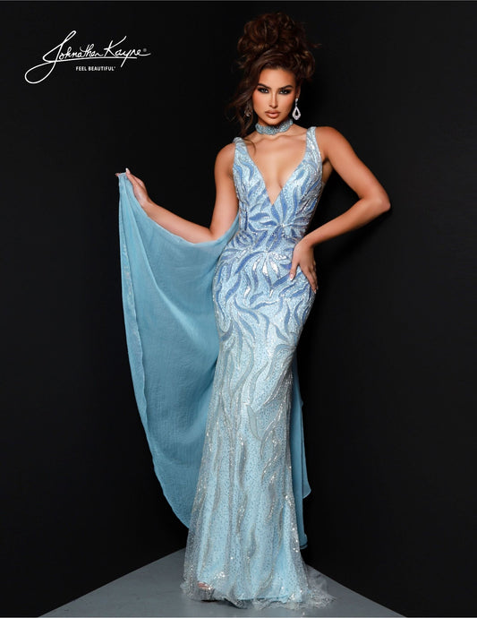 Johnathan Kayne's 2824 Long Prom Dress is perfect for a formal event. Crafted with a flattering mermaid silhouette and beaded choker cape, this elegant gown features a V-neckline, fitted waist and full-length hem. Ideal for pageants or proms. Drape yourself in luxury! This stunning gown features intricate beadwork on a mesh overlay, providing a captivating, shimmering effect. The detachable cape with choker adds a touch of drama and sophistication.