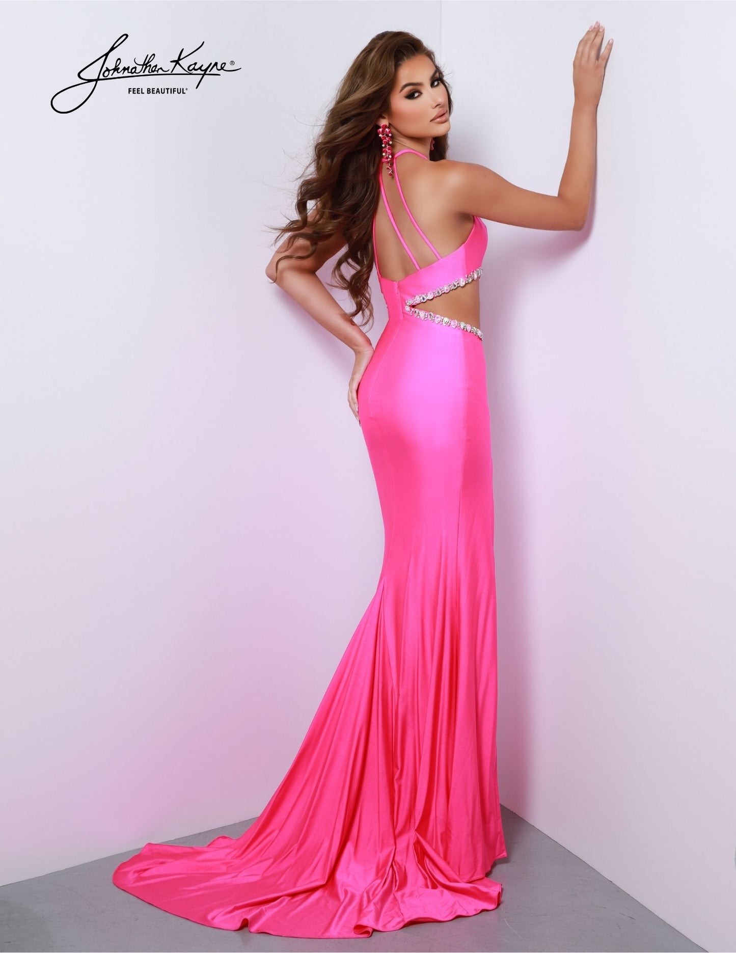 Johnathan Kayne 2855 is an elegant and sophisticated prom dress, perfect for any pageant. Boasting a scoop neck, beaded side cutouts, and sleeveless design, this gown is sure to turn heads. Its fitted silhouette and long skirt ensure a classic, timeless look. Get ready to sizzle! This 4 Way Stretch Lycra gown adorned with a beaded side cutout and thigh-high slit is all about being flirty and fabulous. With the perfect blend of comfort & stunning embellishments, you will turn heads and steal the spotlight.