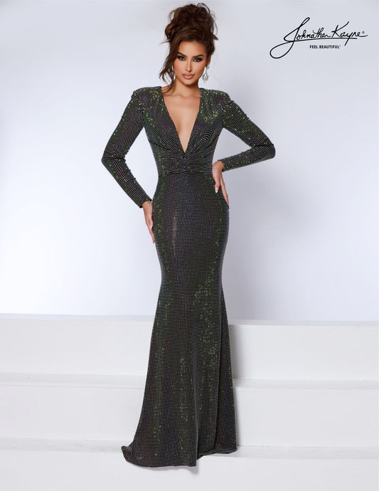 Experience elegance and sophistication with the Johnathan Kayne 2901 Crystal Studded Long Sleeve V Neck Formal Dress Ruched Gown. This stunning gown features a crystal-studded bodice, long sleeves, and a v-neckline for a classic and timeless look. The ruched gown adds a touch of femininity and elegance, making it the perfect choice for any formal occasion. With its superior design and high-quality construction, this dress is sure to make you stand out and leave a lasting impression. 