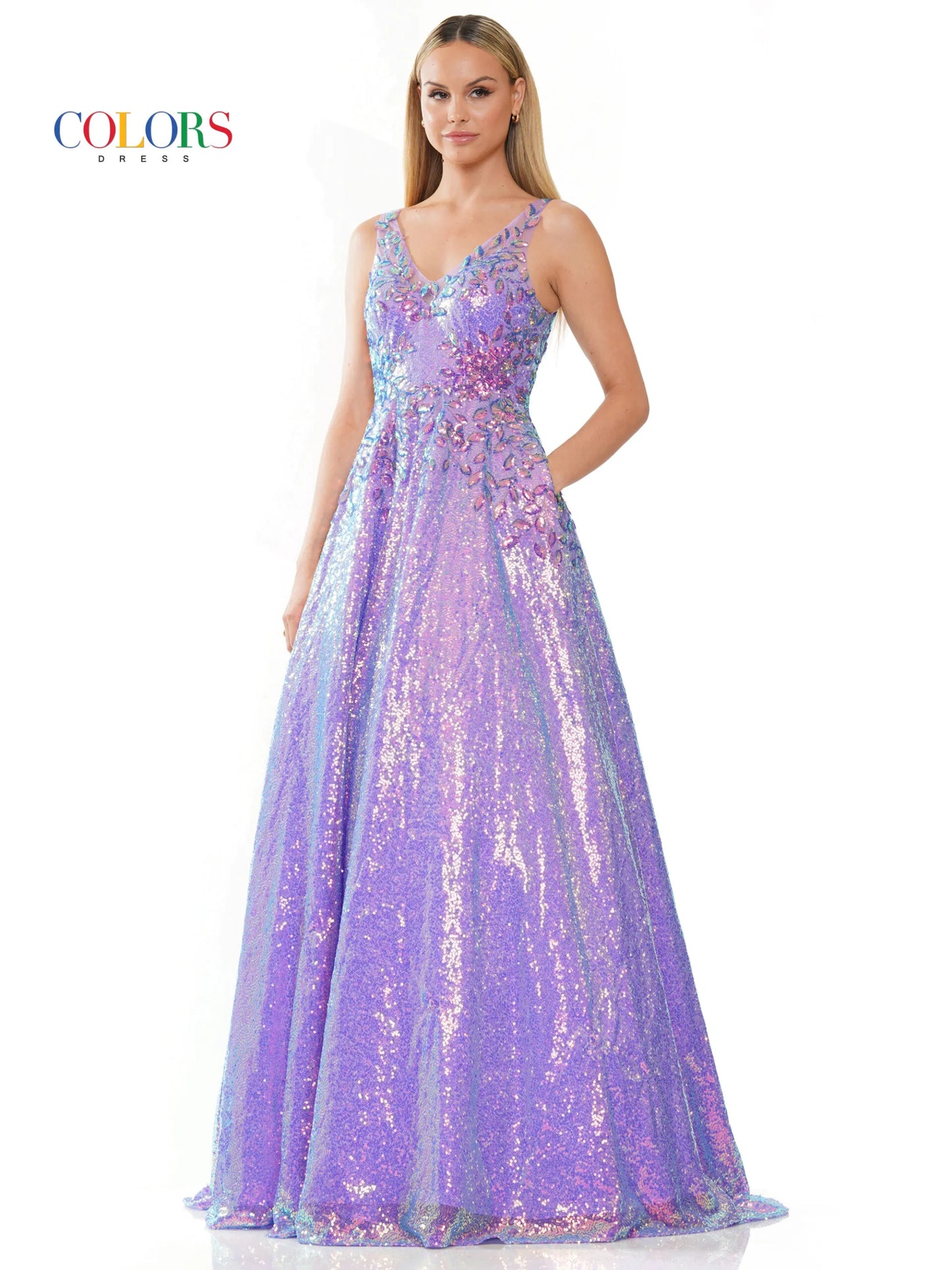 Discover elegance and sophistication with the Colors Dress 3246. This stunning A-Line Prom Dress features striking sequin lace and a flattering V-neckline. The added benefit of pockets makes it perfect for any formal occasion. Complete with a sheer back for a touch of allure.  Sizes: 0-22  Colors: Black, Light Blue, Lavender, Pink