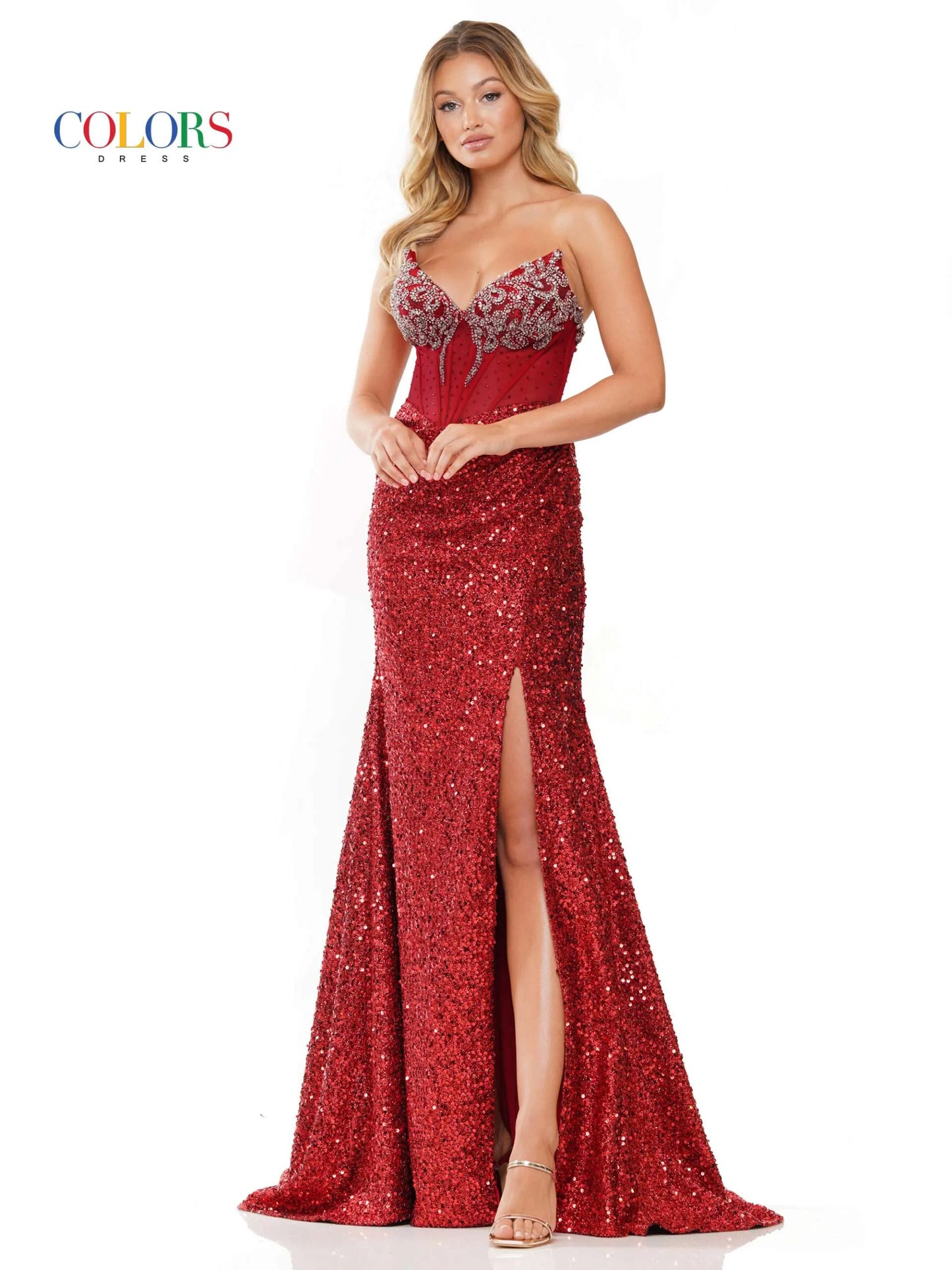 Look stunning in the Colors Dress 3274 Prom Dress. The sheer, beaded corset highlights a peak point v neckline while the sequin fitted silhouette and ruched gown add elegance. With a slit to show off your legs, this dress is perfect for any special occasion.  Sizes: 0-20  Colors: Black, Red, Royal, Deep Green