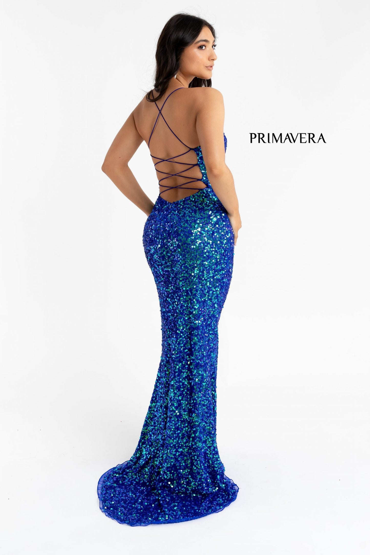 Primavera Couture 3290 This prom dress adds a pop to the multi sequins dress.  With a scoop neckline and spaghetti straps that cross and tie in the back.  This long evening dress has a side slit.  Available sizes:  000, 00, 0, 2, 4, 6, 8, 10, 12, 14, 16