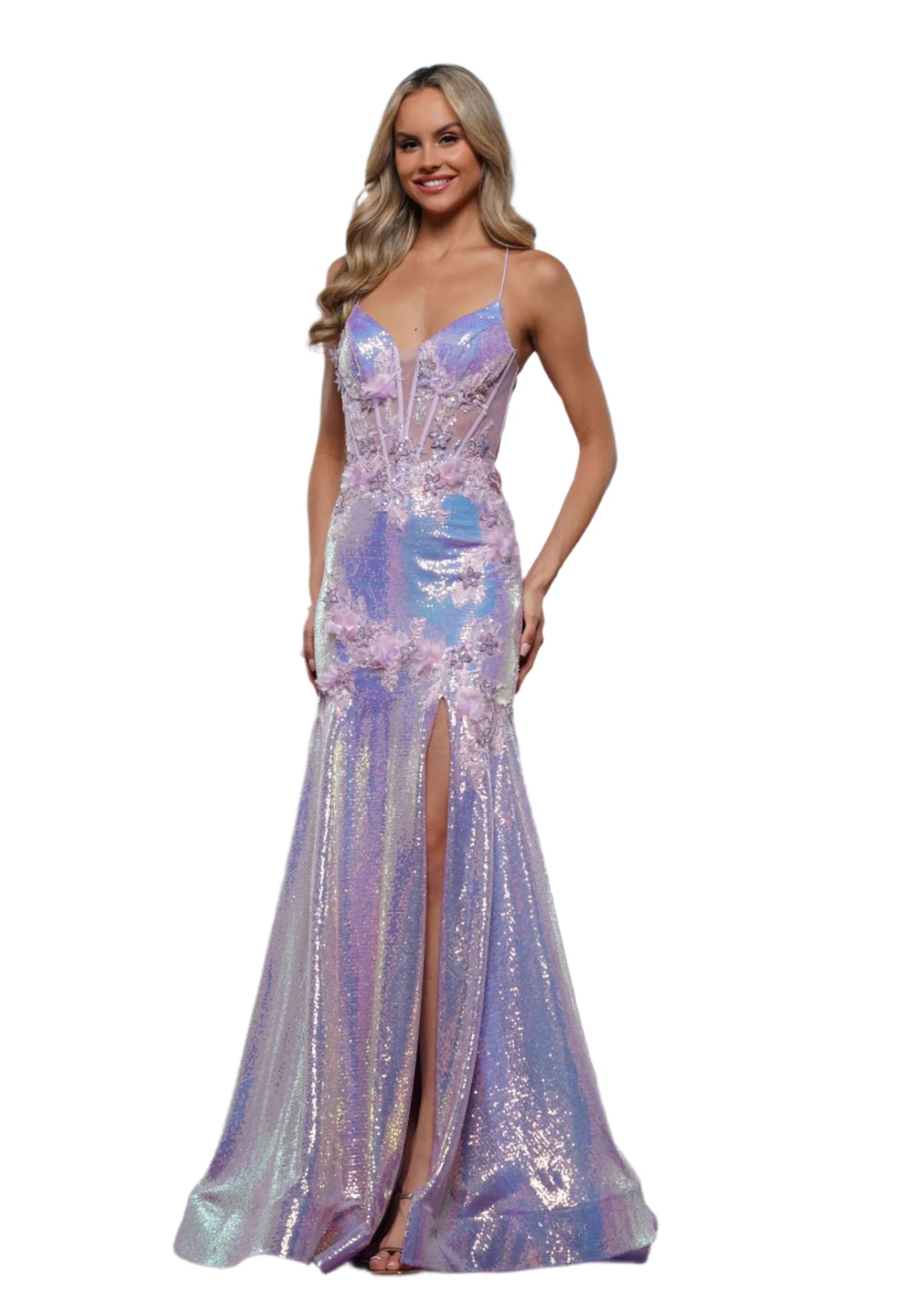 This Colors Dress 3540 is a stunning sheer sequin mermaid corset prom dress with a backless design. The slit adds an alluring touch while the corset offers a flattering fit. Perfect for pageants or any special occasion, this dress will make you stand out in the crowd.