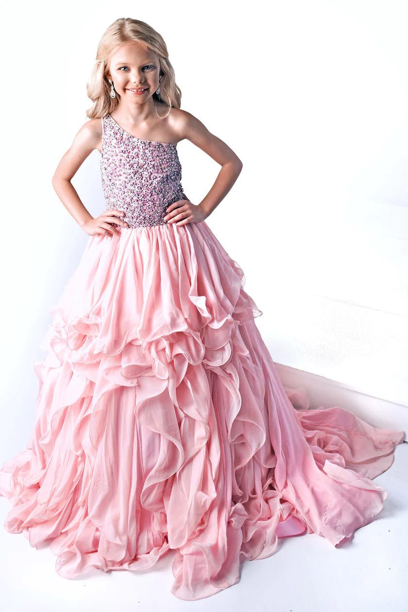 Ava Presley 38024 offers an elegant, timeless look with its Long Ruffle Layer and Beaded Bodice. This one Shoulder dress is made with high quality fabric for ultimate comfort and style. Perfect for special events and pageants, this timeless design will make any girl shine.  Sizes: 2-16  Colors: Blush, Light Blue, Red, White, Royal