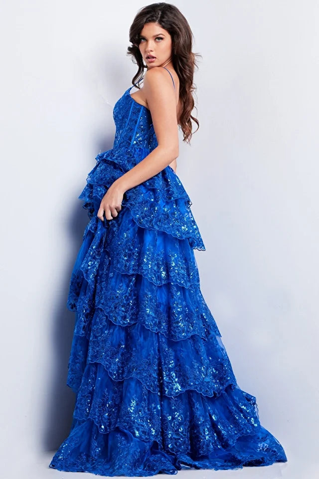 The Jovani 38144 prom dress is a true showstopper and a perfect choice for those looking to make a statement at a formal event. This gown belongs to the formal collection and is designed to capture attention and create a memorable look. The dress is crafted from delicate and ethereal tulle material, which gives it a light and airy quality while maintaining a sense of sophistication.