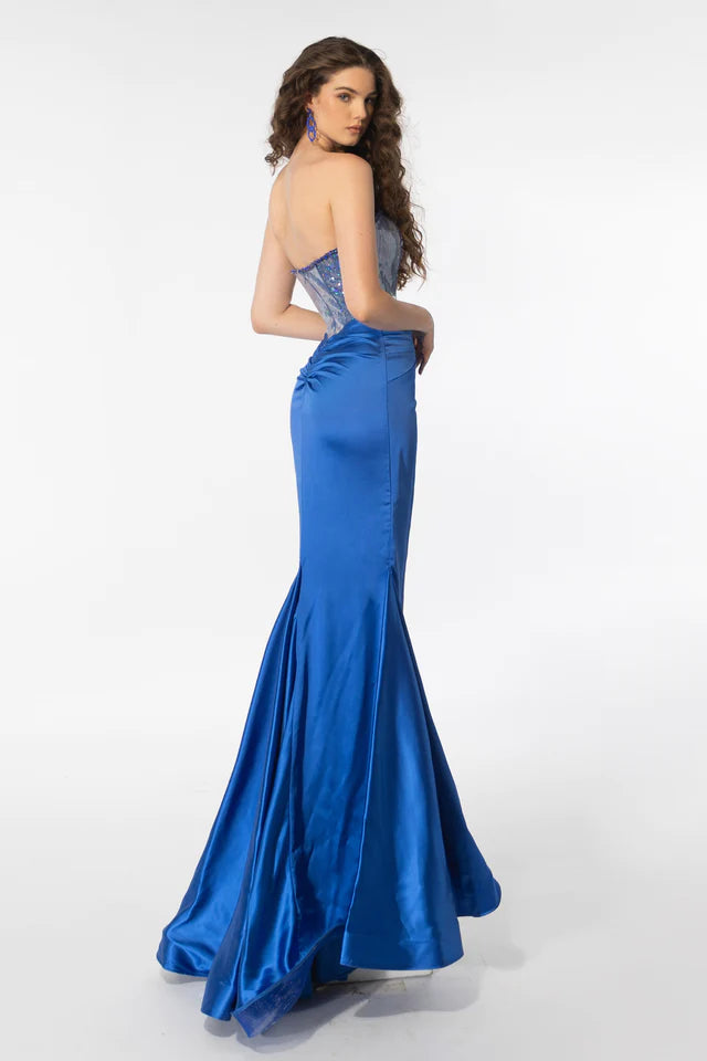 Crafted from high-quality materials, the Ava Presley 39282 Strapless Long Prom Gown is the perfect choice for any formal event. The sequin bodice adds a touch of sparkle, while the charmeuse skirt provides a soft and elegant look. Stand out in style with this stunning and versatile dress.