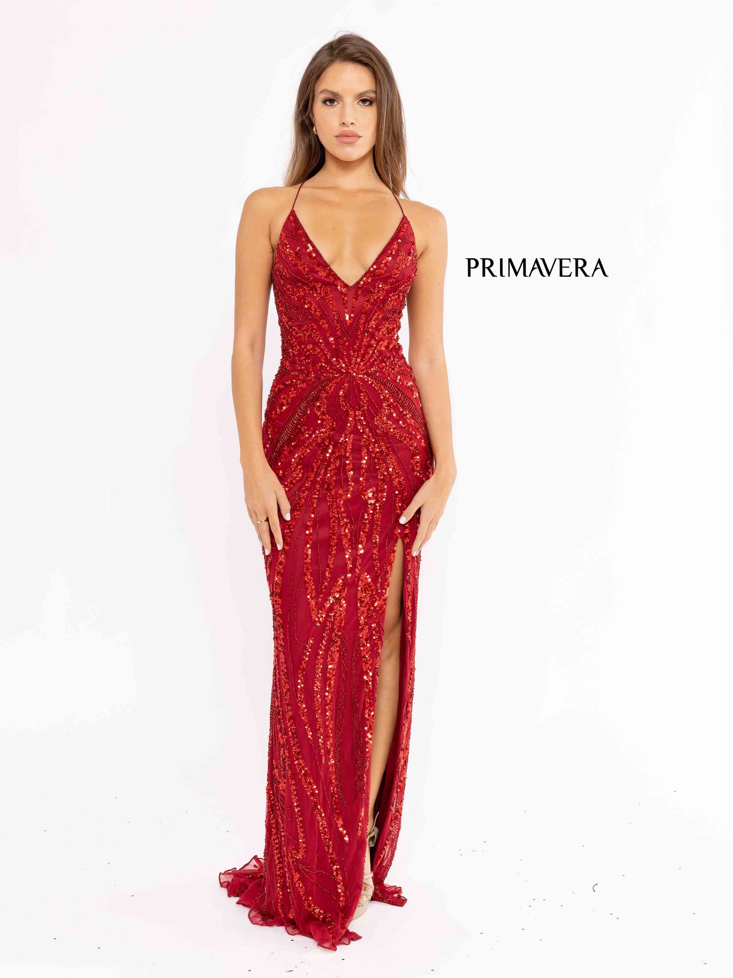 Primavera Couture 3958 Prom Dress Long beaded Gown. Its has a slit and a beautiful design on the gown.