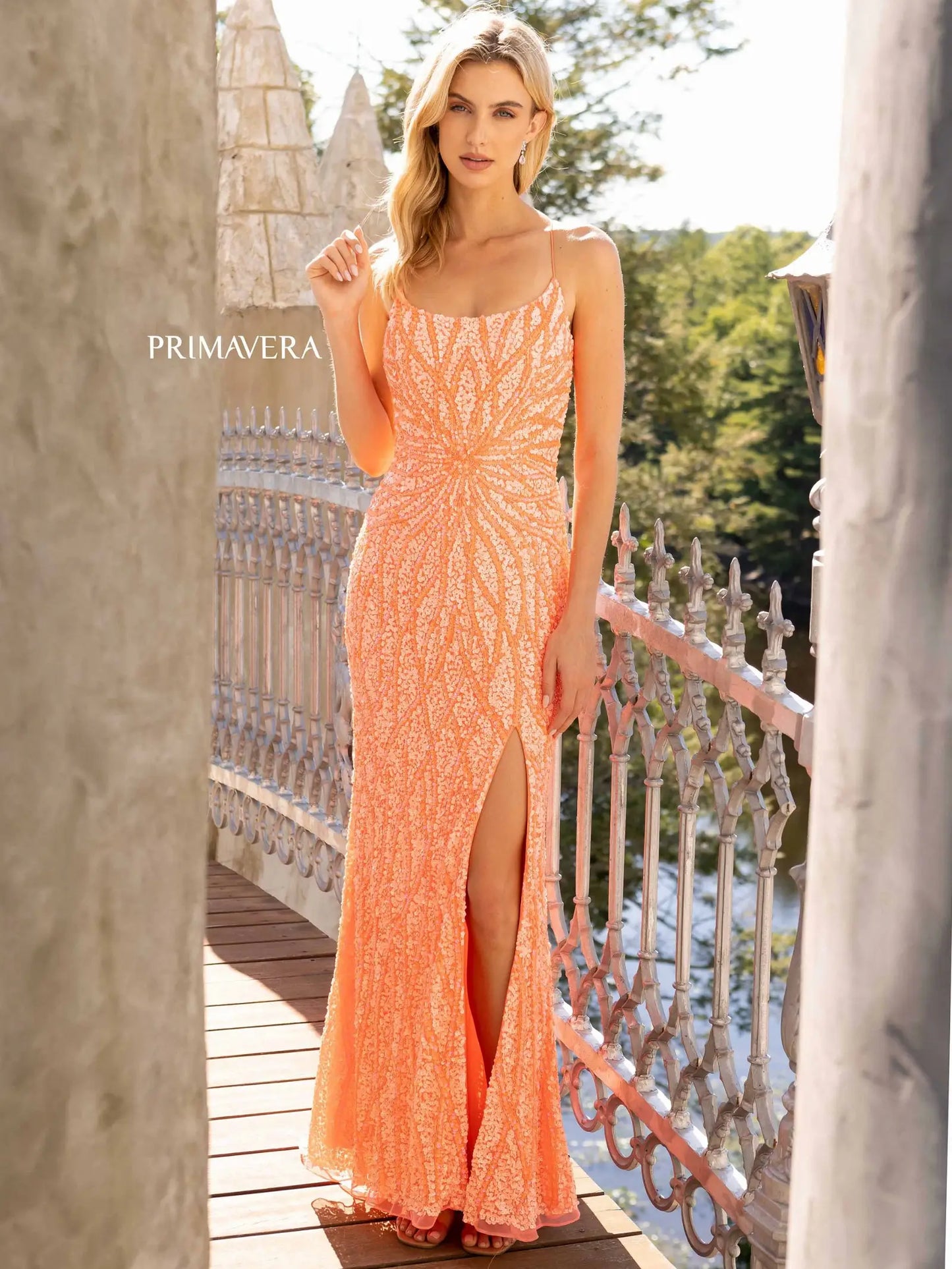 Primavera Couture 3959 Prom Dress Long Beaded Gown. This Gown has a beautiful design all over. Primavera Couture 3959 Sequin Scoop neck Prom Dress Backless Corset Slit Formal Gown  Size-000-18  Colors-Lilac, Coral