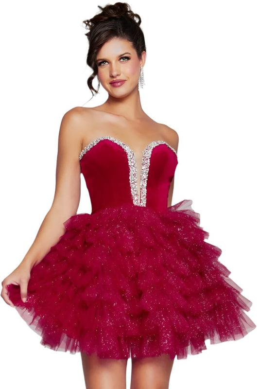 Expertly designed by Jovani, the 40352 Velvet Short Cocktail Dress offers a stunning combination of velvet bodice and layered tulle skirt. The strapless sweetheart neckline is adorned with sparkling crystals, making this gown perfect for homecoming or pageant events.