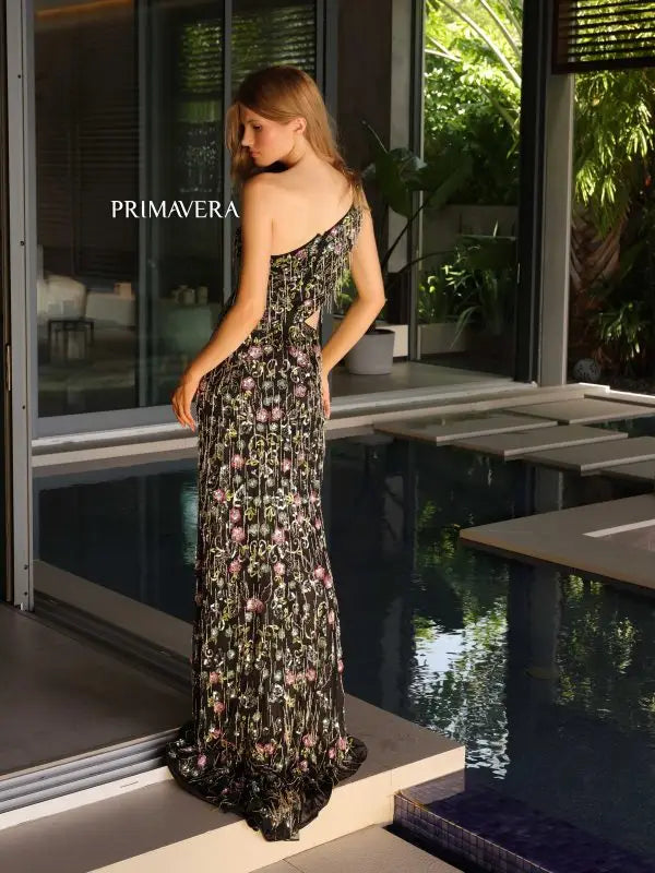 Make a lasting impression in the Primavera Couture 4131 Long Prom Dress. This stunning gown features intricate beading and a beautiful floral design, along with side cut outs and fitted fringes for a flattering silhouette. Perfect for formal events or pageants, this gown is sure to make you stand out with its elegant and unique details.