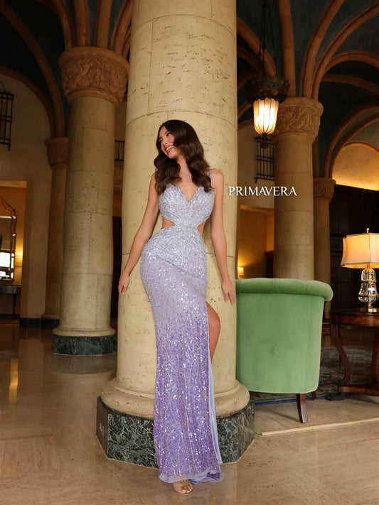 This Primavera Couture 4136 prom dress offers a stunning look with its cutout corset bodice, backless design, and ombre beaded skirt. Intricately sequined and with a daring thigh-high slit, this gown is sure to turn heads. Ideal for any special occasion.  Sizes: 000-18  Colors: Pink, Lilac, Black