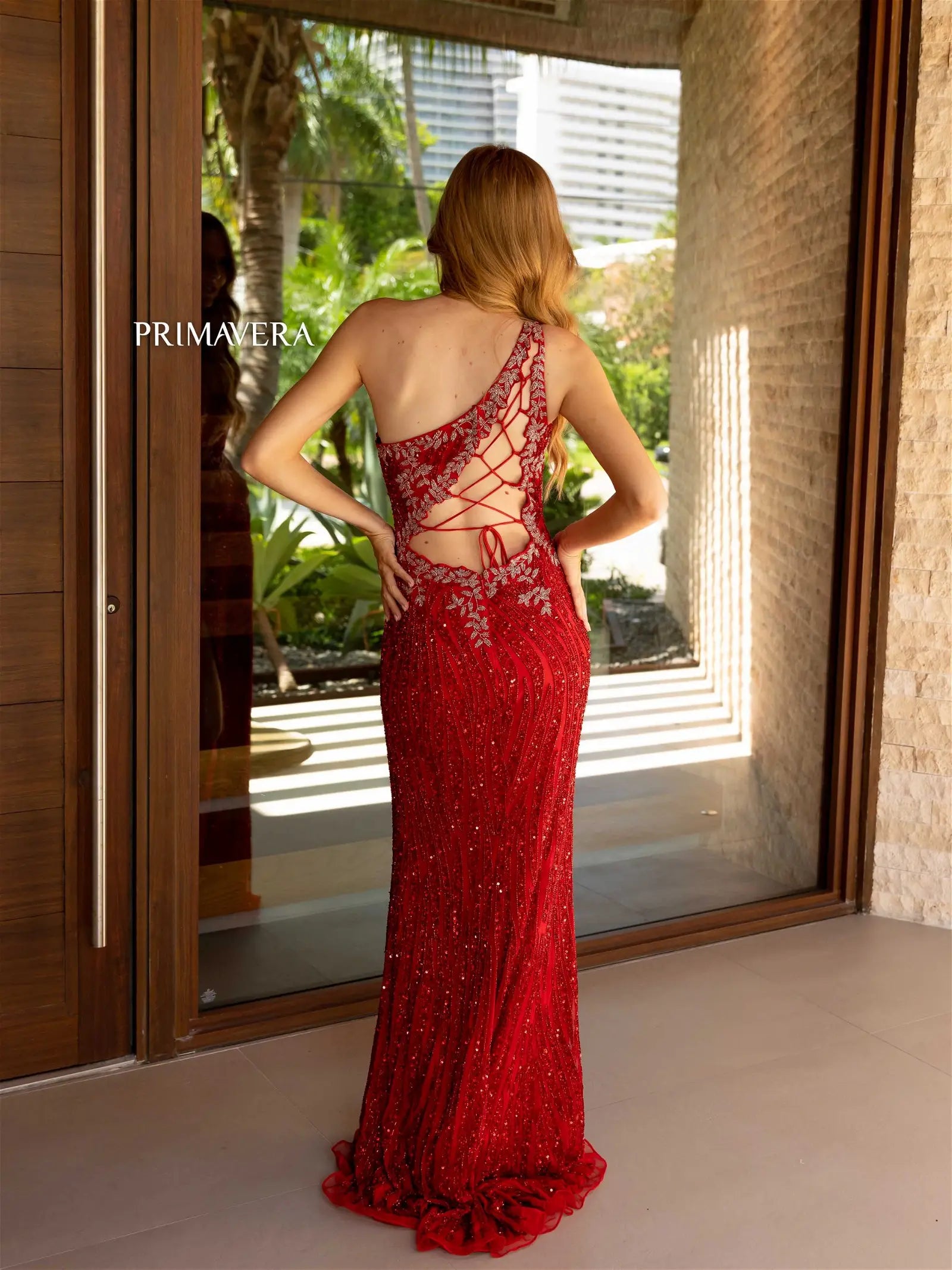 Expertly crafted by Primavera Couture, the 4144 Long Prom Dress is a stunning choice for any formal occasion. The fitted body and cut out design provide a sleek and modern look, while the sheer high slit adds a touch of elegance. Complete with a lace up back, this gown promises to make you feel confident and sophisticated.