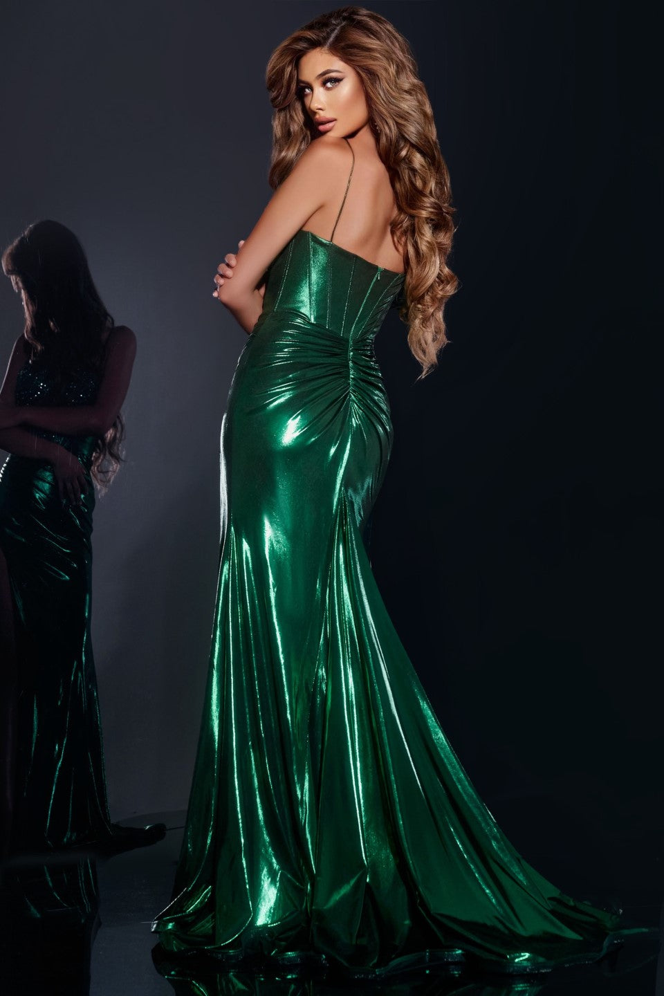 Experience pure elegance and luxury with Jovani 42336. This stunning prom dress features a shimmering metallic corset that accentuates your figure and a sheer beaded bodice for a touch of sophistication. With a thigh-high slit and a flowing evening gown, this dress is sure to make a statement at any formal event.