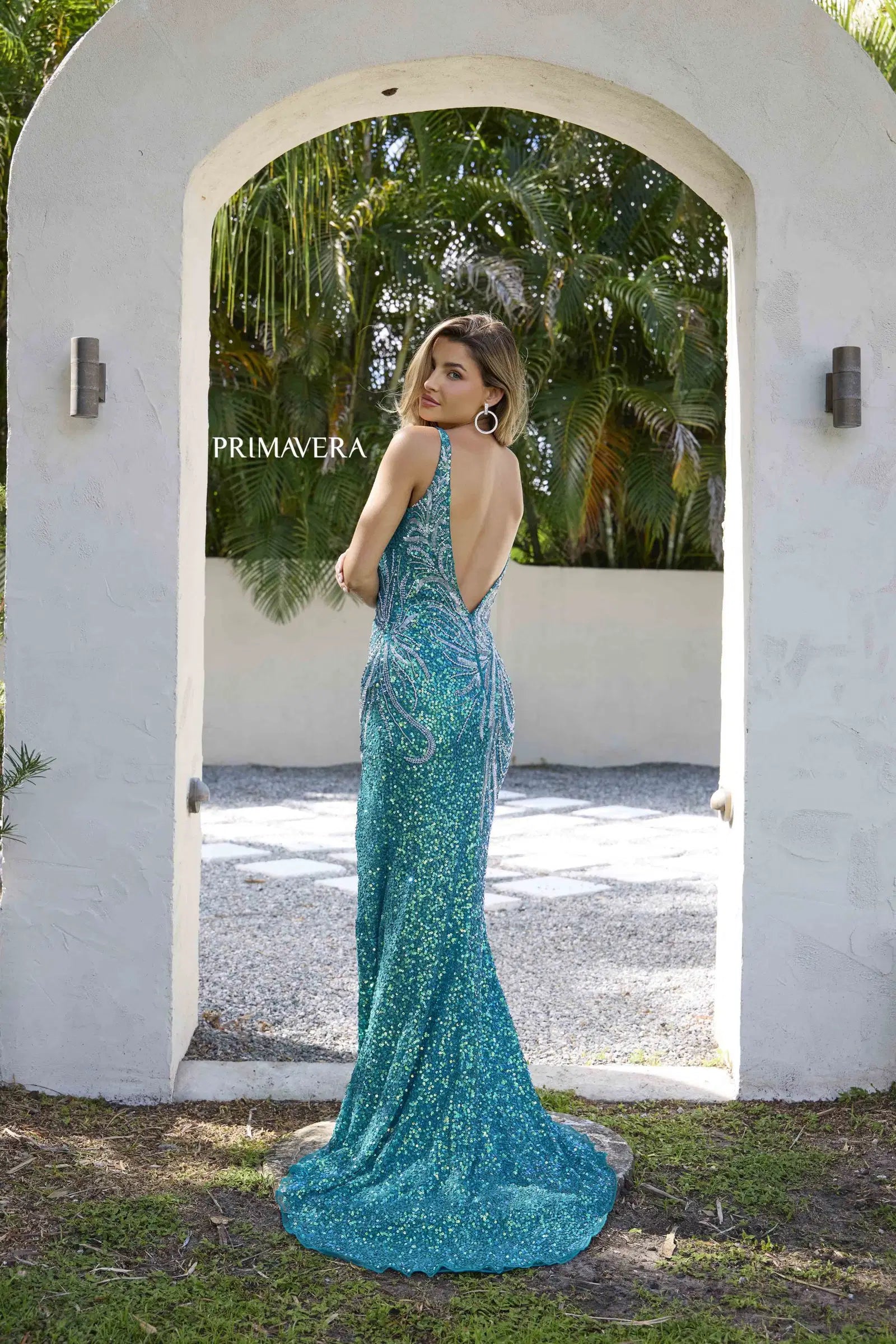 Step into the spotlight with the Primavera Couture 4333 Sequin Beaded V Neck Prom Dress. This stunning gown features intricate sequin and bead detailing, a flattering v-neckline, and a bold slit design for added glamour. Embrace a formal and alluring look with this backless dress, perfect for prom or any special event.

Sizes: 000-18

Colors: Midnight, Teal, Powder Blue