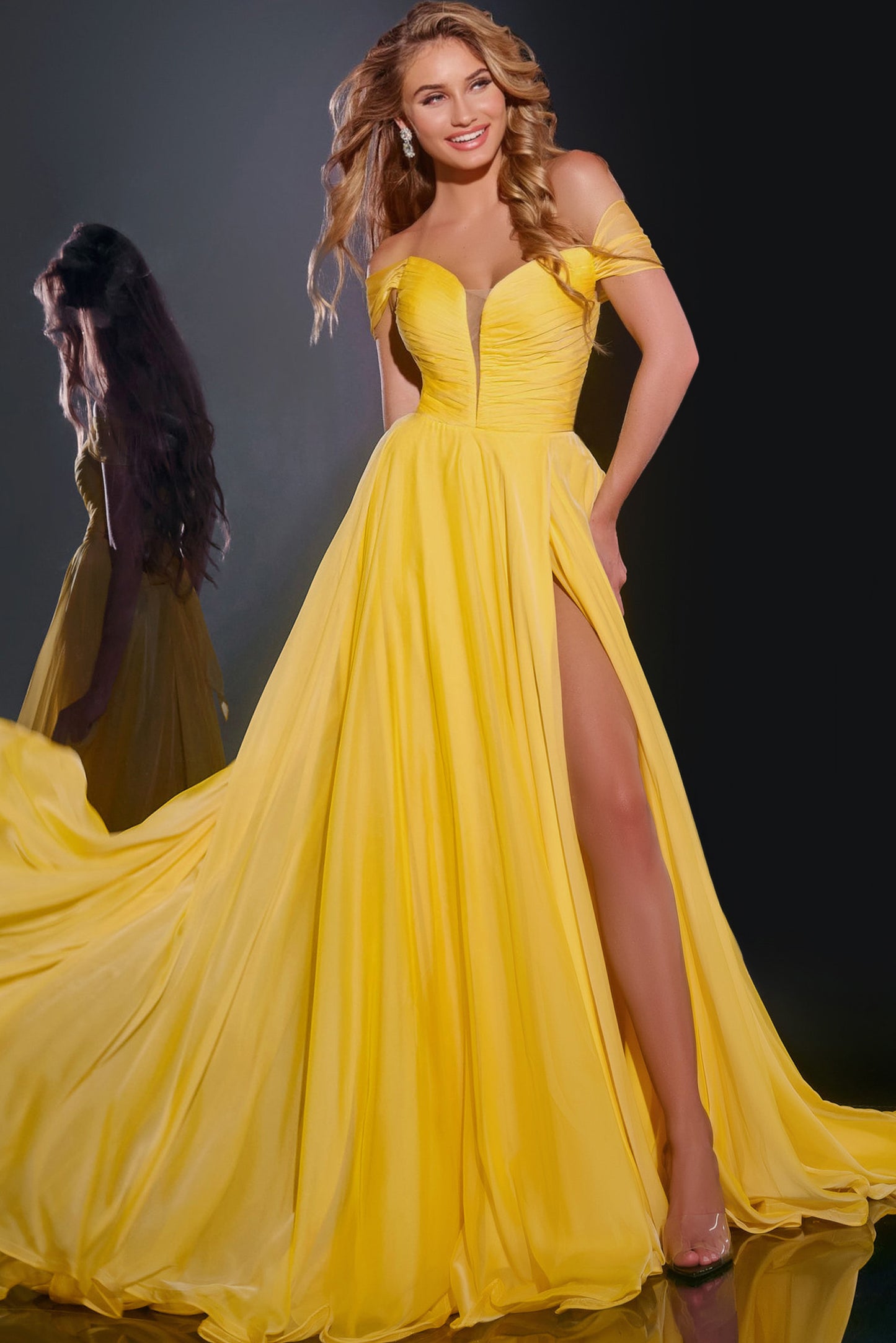 This Jovani 43842 dress is a stunning A Line maxi formal gown with a slit, corset, and chiffon material, perfect for prom or any formal event. Its off-the-shoulder design adds elegance and the backless style gives a sexy touch. Expertly crafted for a flawless fit.&nbsp;