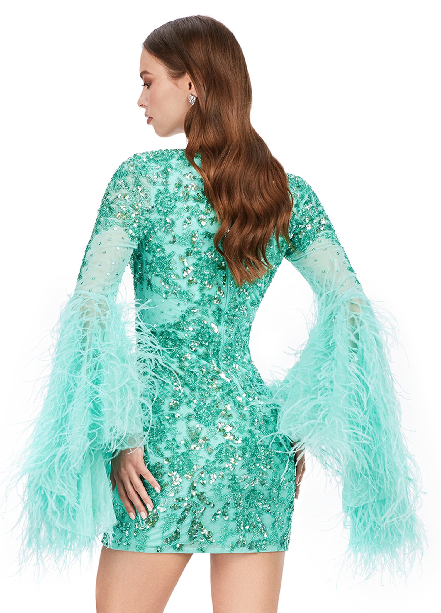 Ashley Lauren 4603 Fully Beaded Bell Sleeve With Feathers V-Neck Cocktail Homecoming Dress. Make a statement in this fully beaded cocktail dress with feather adorned flare sleeves! The look is complete with a V-neckline, full back and fitted skirt.