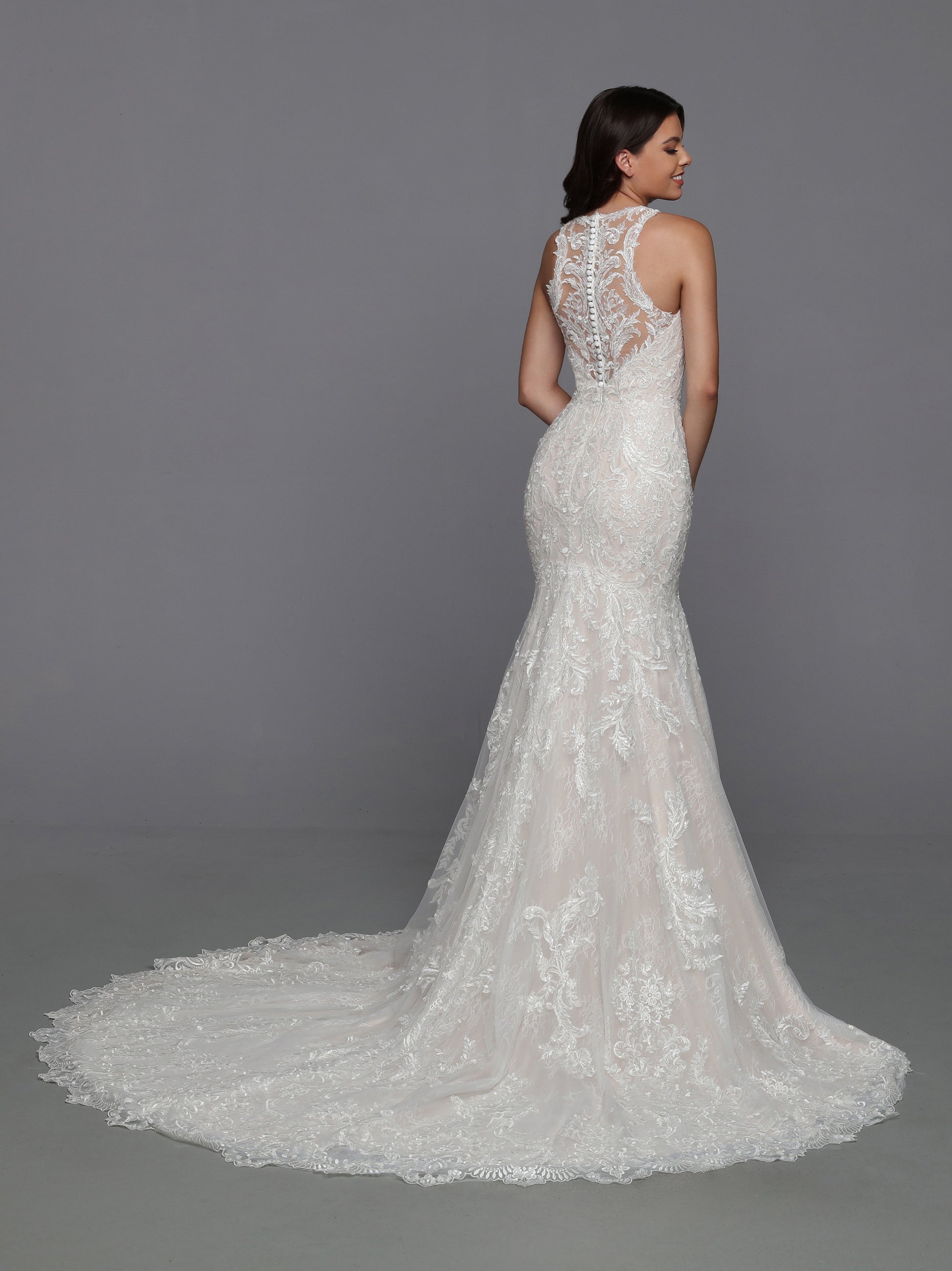 DaVinci Bridal 50783 Mermaid Fit And Flare Lace V-Neck Detachable Train Wedding Gown. What could be better than a delicious lace mermaid wedding dress? A mermaid dress with a removable ball gown bridal skirt! The sheer lace racerback bodice and lace-edged train make this look practically perfect.