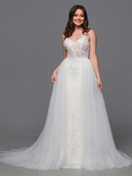 Elevate your bridal look with the Davinci Bridal 50843 wedding dress. This luxurious gown features a sheer embroidered bodice with intricate beading, adding a touch of glamour to your special day. The detachable overskirt adds a layer of versatility, making this gown perfect for any venue. Sparkle and shine with the sequin details, making you the star of the show. The detachable tulle skirt turns this pretty lace slip dress design into a full-fledged ball gown wedding dress.