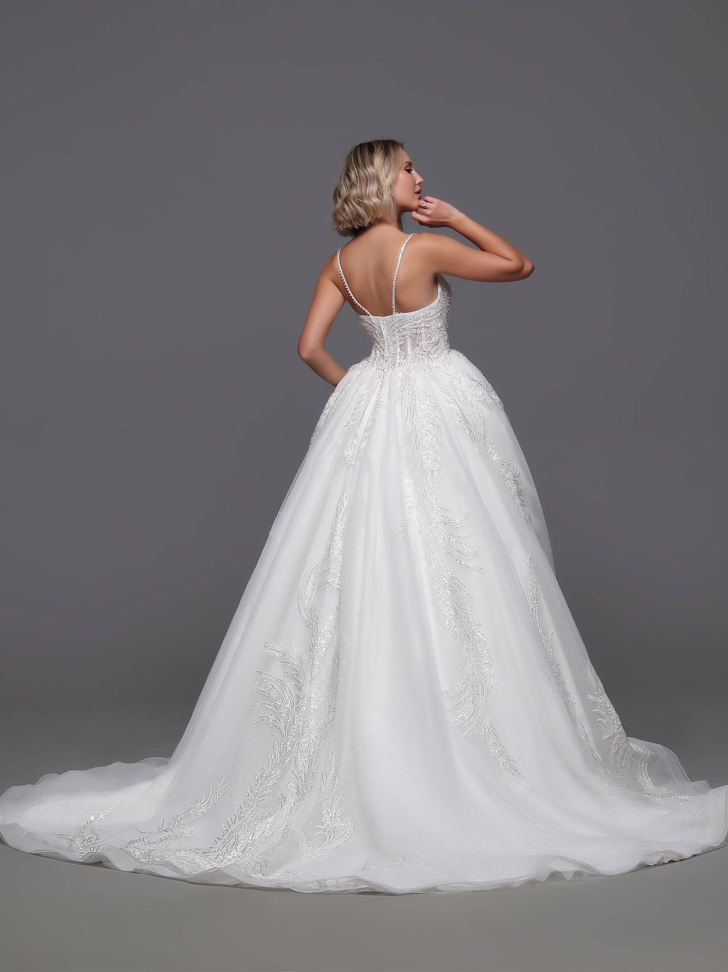 Elevate your bridal style with our Davinci Bridal 50876 beaded sequin wedding dress. The intricate beading and shimmering train add a touch of elegance fit for a princess. Walk down the aisle in this stunning gown and make a statement on your special day.