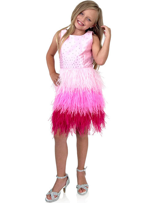 A must-have for the fashion-savvy young girl, this Marc Defang 5118 Girls Short Feather Ombre Pageant Dress features a unique, hand sewn ostrich feather all-over skirt with an ombre pattern and a beaded waistline. Embellished with hand-placed crystals along the top, this dress is fully lined and features a center back invisible zipper for a comfortable fit.  Sizes: 4,5,6,7,8,9,10,11,12,13,14  Colors: Pink, Hot Pink  *Choose Custom color from swatches! allow 25-30 days delivery