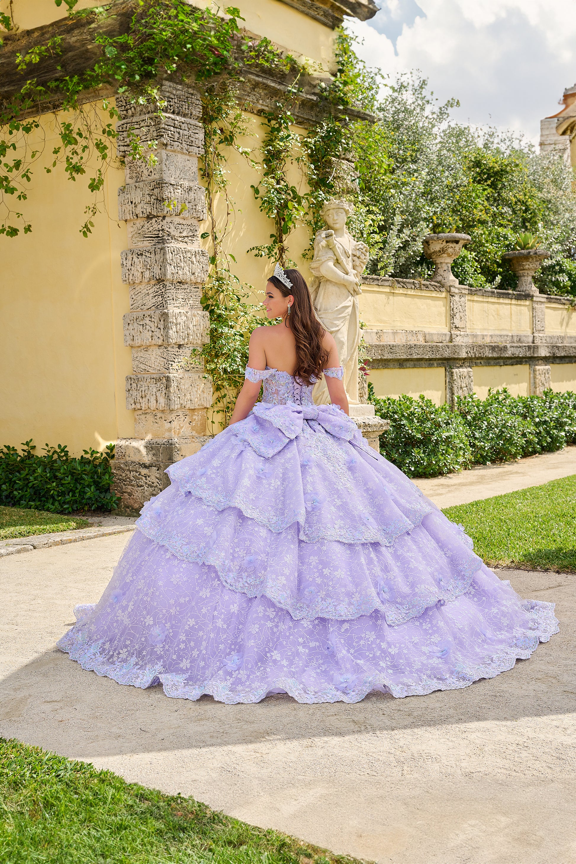 Get ready to shine in this enchanting quinceañera gown! The sweetheart neckline radiates elegance, while off-the-shoulder sleeves bring a playful charm. With its fitted bodice and full-length ball gown silhouette, you'll captivate everyone's gaze. But what truly sets this gown apart are its special touches. Delicate lace 