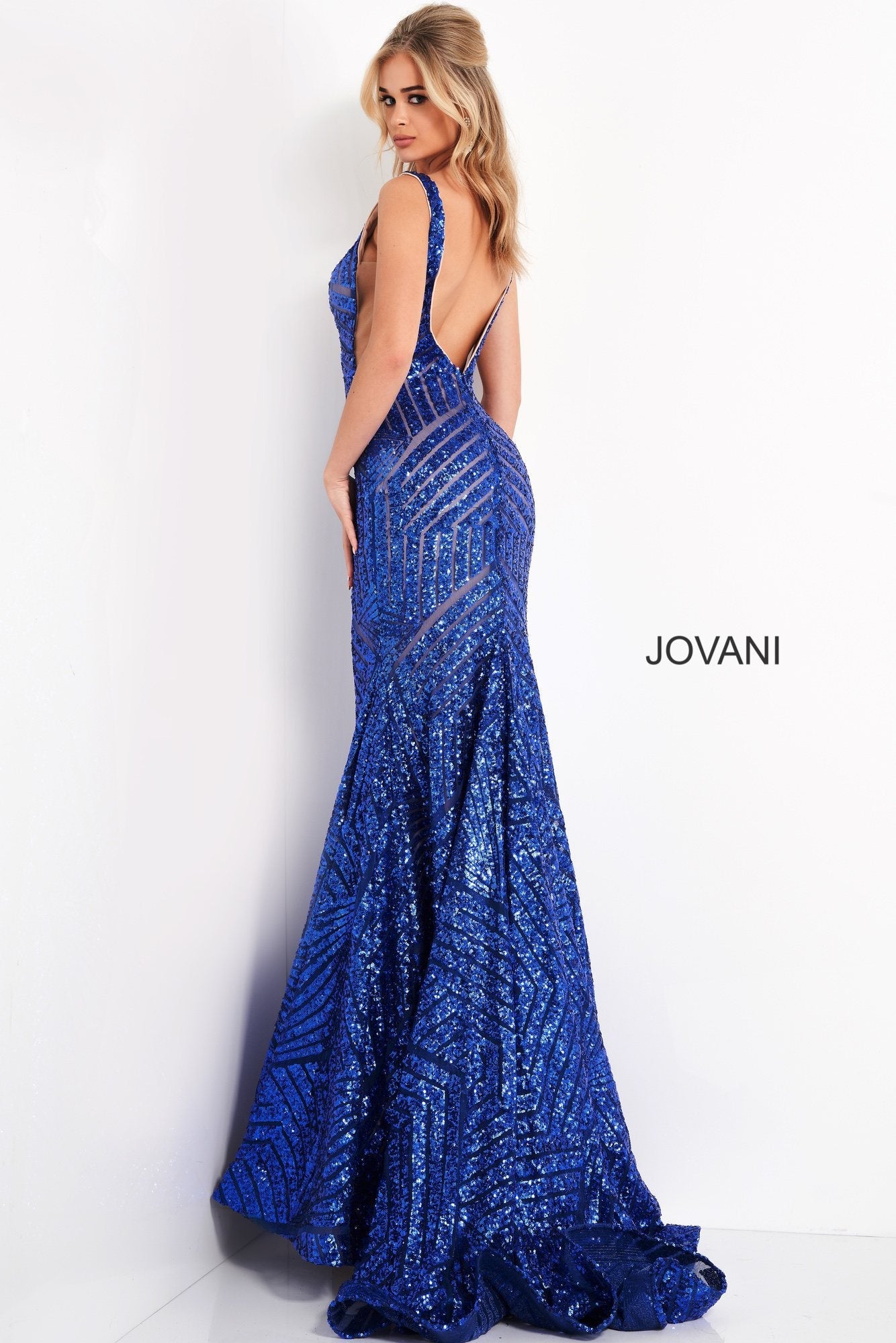 Long Jovani 59762 Prom Dress, Featuring a plunging neckline & A Fully sequined Fitted Mermaid Bodice. This Open V Back Pageant Gown & prom dress is perfect for the stage is has a lush trumpet sequin embellished skirt and sweeping train. 