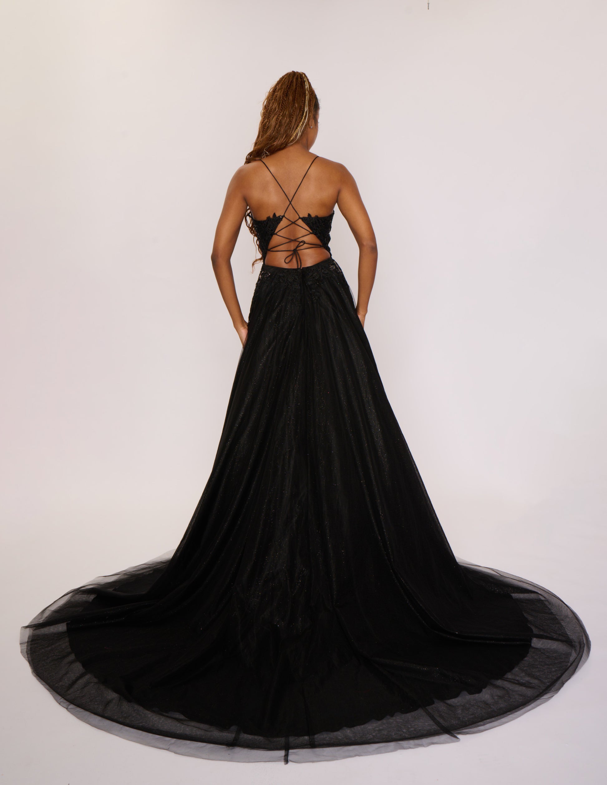 Expertly crafted by Nina Canacci, the 6624 Long A Line dress features a flattering corset bodice and a stunning backless design. The elegant train and A-line silhouette make it the perfect choice for prom, pageants, or any formal event. Elevate your style with this timeless and beautifully designed gown.

Sizes: 4-14

Colors: Black, Red, Light Blue