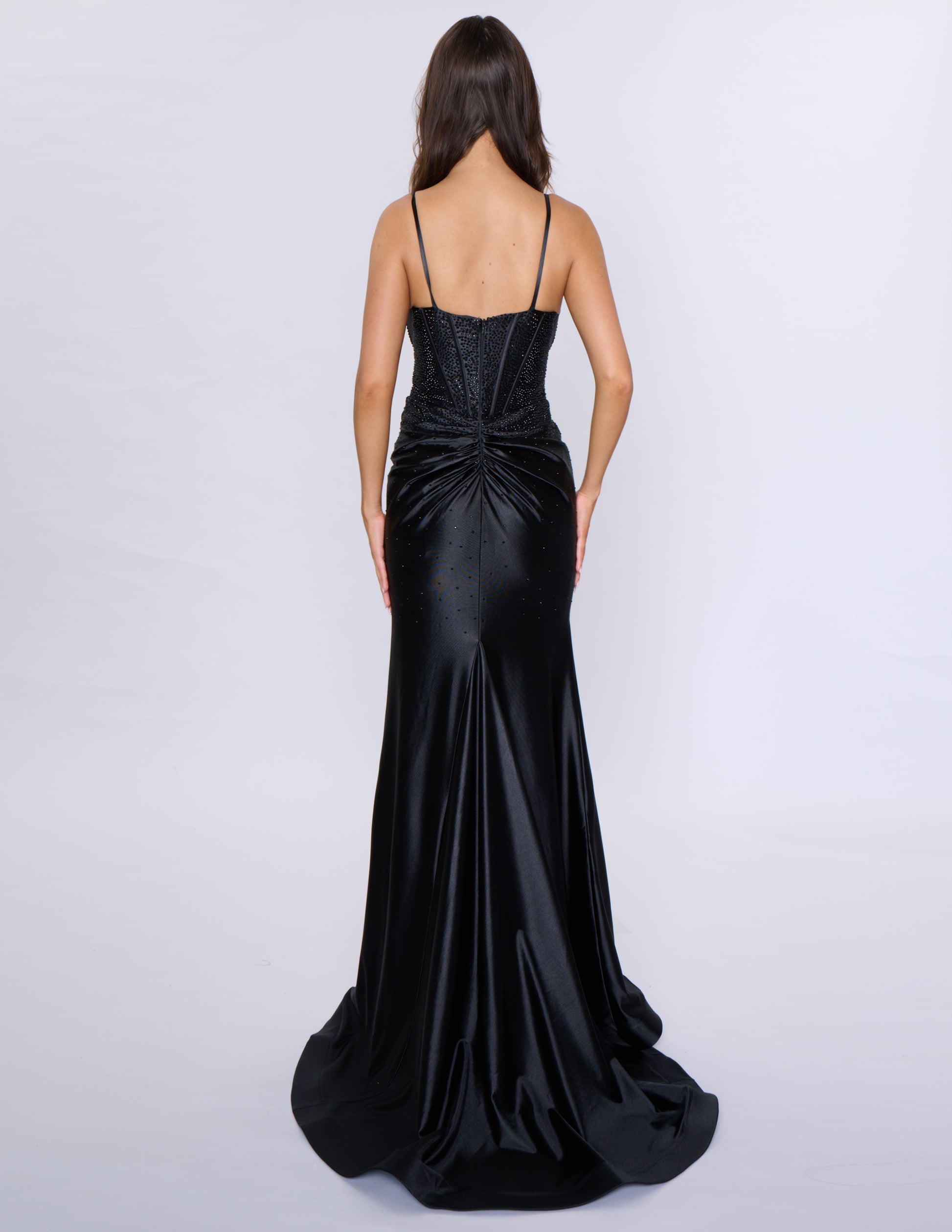 Experience elegance and glamour with our Nina Canacci 6687 long fitted prom dress. Featuring a crystal corset and a V-neck with a tasteful slit, this dress is perfect for formal evening events. Its figure-hugging fit and intricate details will make you stand out and feel confident all night long.

Sizes: 0-16

Colors: Red, Royal, Black, Blue