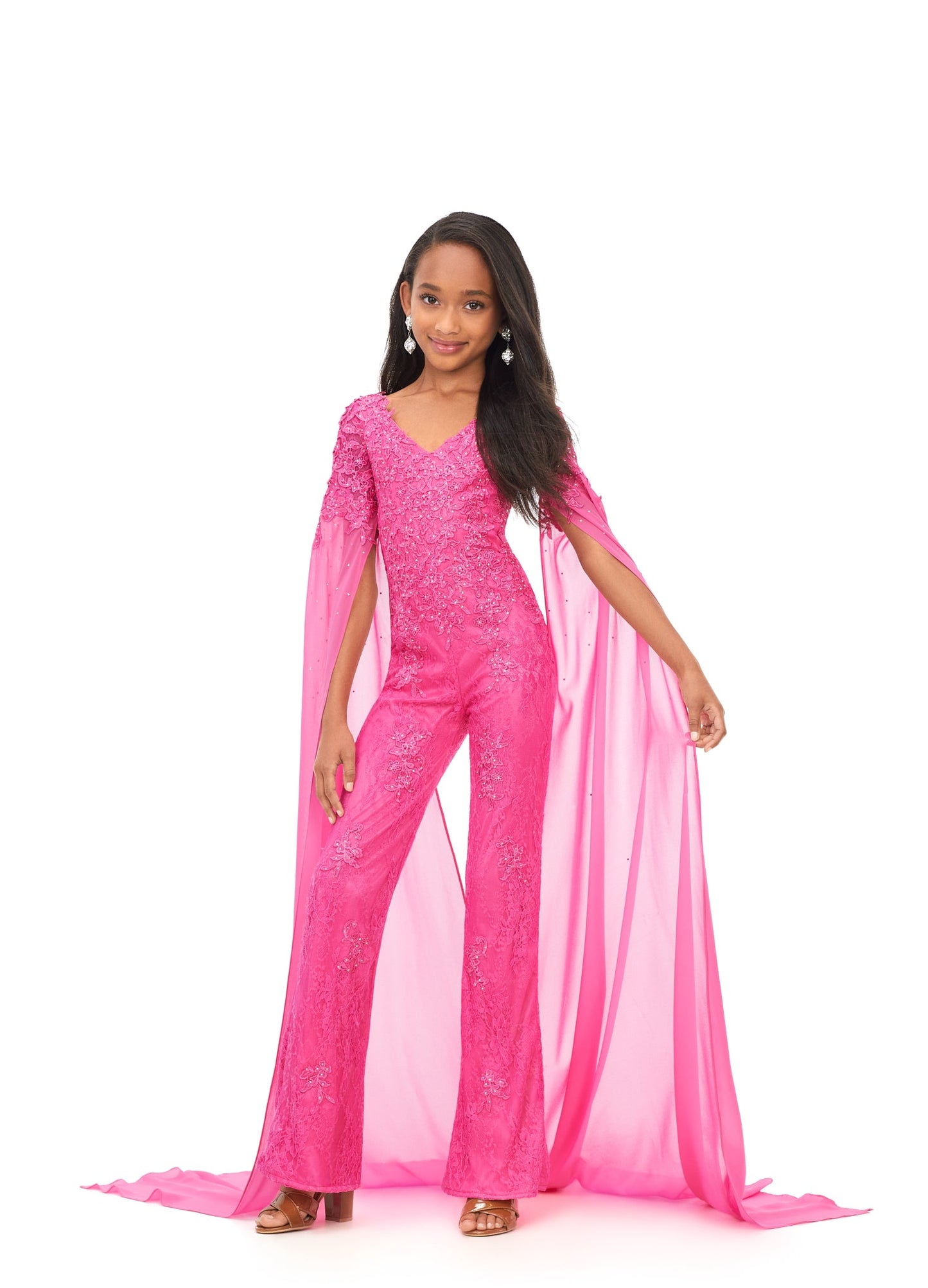 Ashley Lauren Kids 8162 Lace Girls Cape Sleeve Jumpsuit Formal Fun Fashion V Neck Chiffon This jumpsuit is bringing all the drama. It features a v-neckline, lace embroidery and dramatic cape sleeves perfect for your next fun fashion or runway. V-Neckline Embroidery Cape Sleeves Jumpsuit