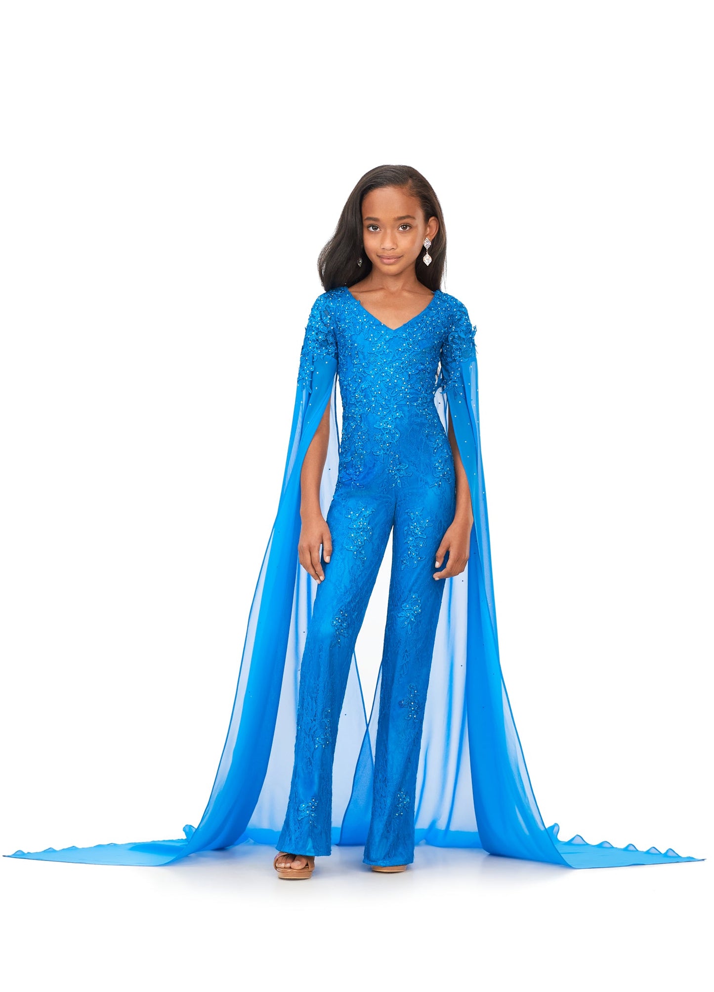 Ashley Lauren Kids 8162 Lace Girls Cape Sleeve Jumpsuit Formal Fun Fashion V Neck Chiffon This jumpsuit is bringing all the drama. It features a v-neckline, lace embroidery and dramatic cape sleeves perfect for your next fun fashion or runway. V-Neckline Embroidery Cape Sleeves Jumpsuit