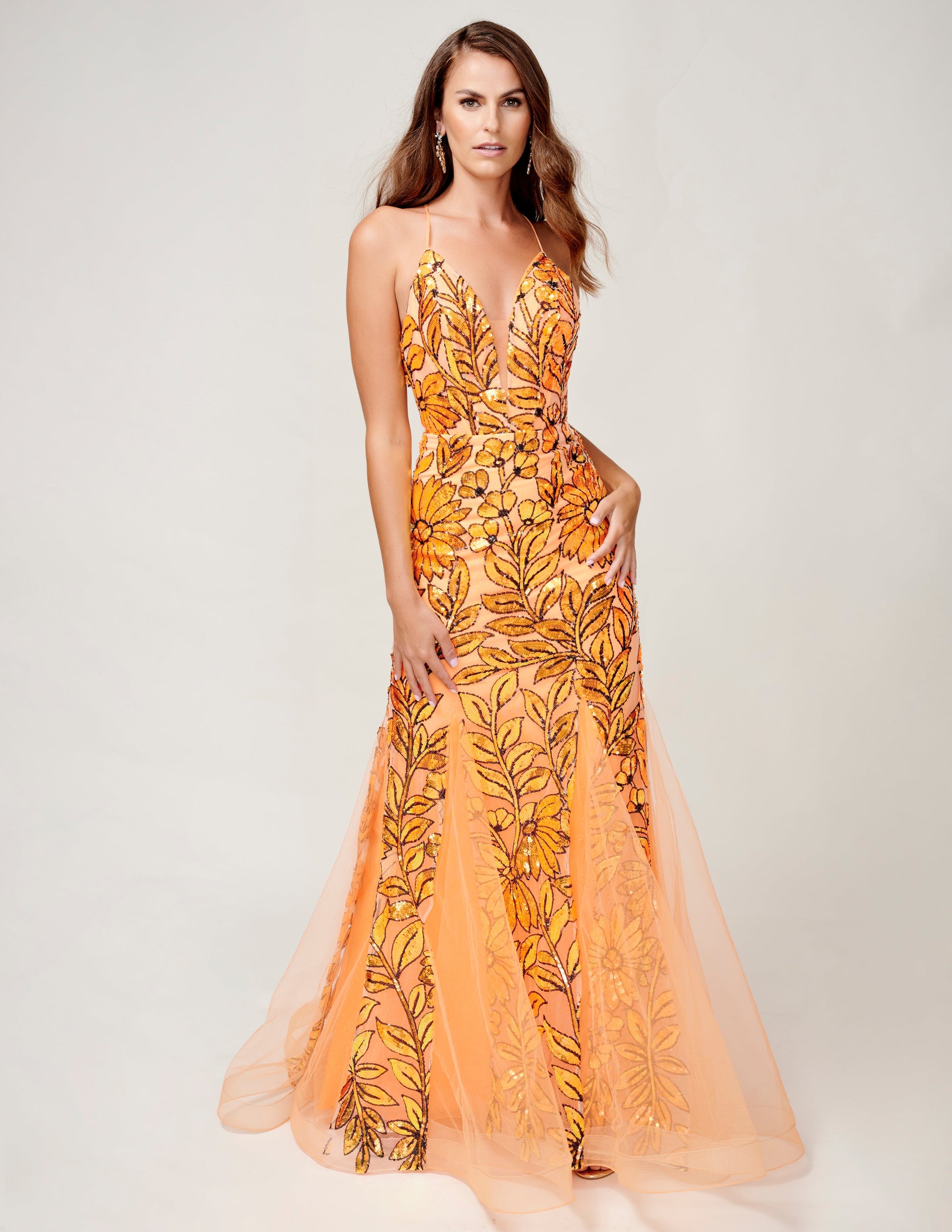 <p data-mce-fragment="1">This stunning Nina Canacci 8236 Prom Dress features a sequin mermaid design, highlighted by a backless corset and V-neckline. Perfect for formal events, this gown offers a flattering silhouette and elegant style. Shine and stand out at your next event with this must-have dress.</p> <p data-mce-fragment="1">Sizes: 0-12</p> <p data-mce-fragment="1">Colors: Pink, Navy, Orange</p>