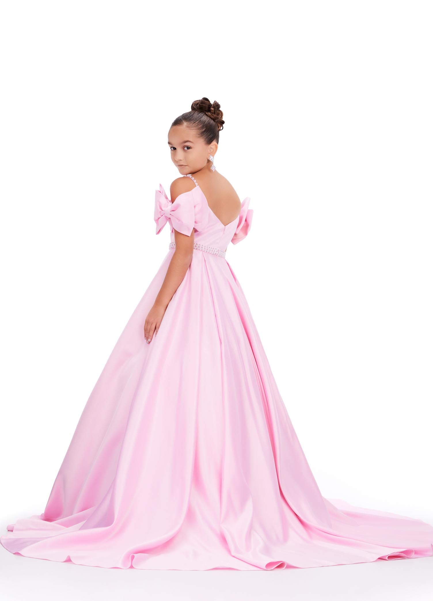 Ashley Lauren Kids 8237 Off the Shoulder Satin Ball Gown Pageant Dress Bows A Line Girls Feel like a princess in this satin ball gown. This gown features off the shoulder bows and pearl accents on the straps and belt.  COLORS: Aqua, Pink, White, Lilac Sizes: 2-16 Off Shoulder Beaded Accents Ball Gown Satin