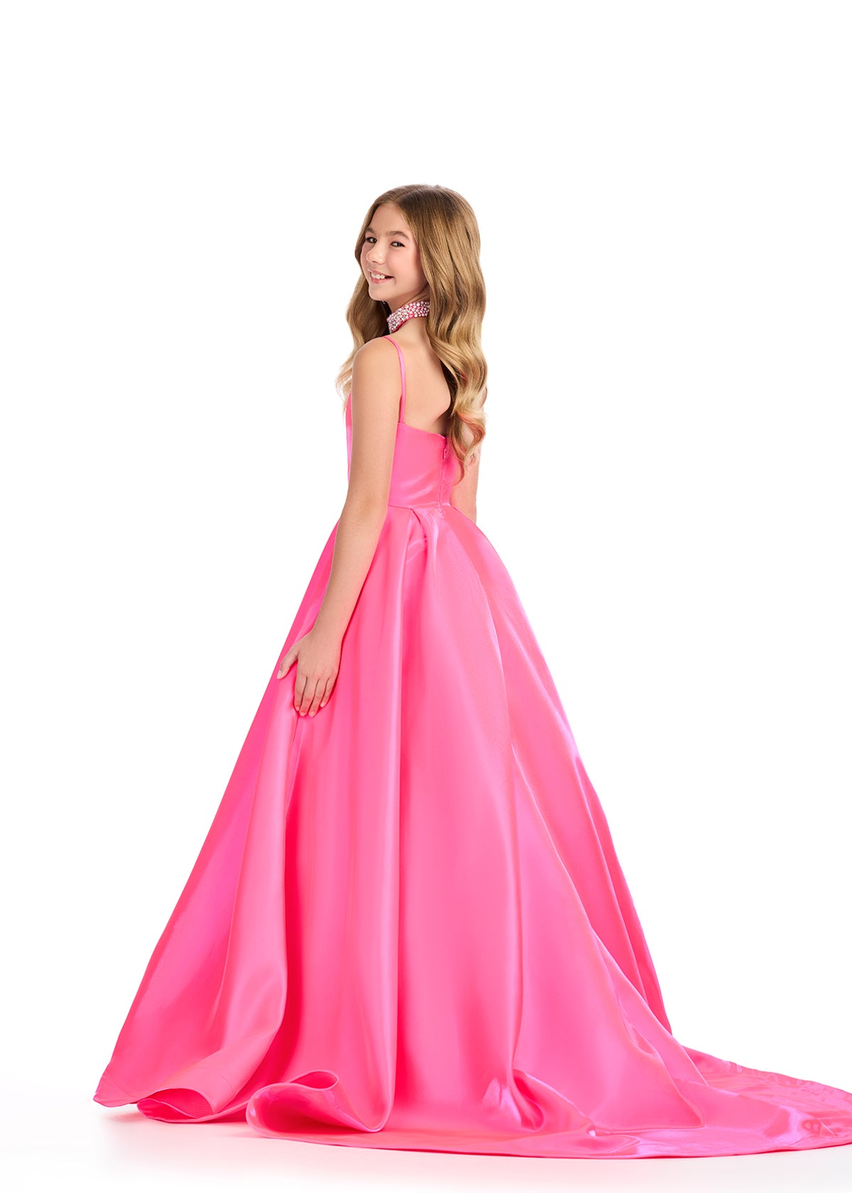 Indulge in luxury with the Ashley Lauren 8275 Girls Satin Ballgown. The satin material exudes elegance and the embellished choker adds a touch of sophistication. The scoop neckline and spaghetti straps create a flattering silhouette for any formal event. Elevate your little girl's look with this exquisite ballgown. Pageant

Colors:&nbsp; Orchid, Hot Pink, Peacock