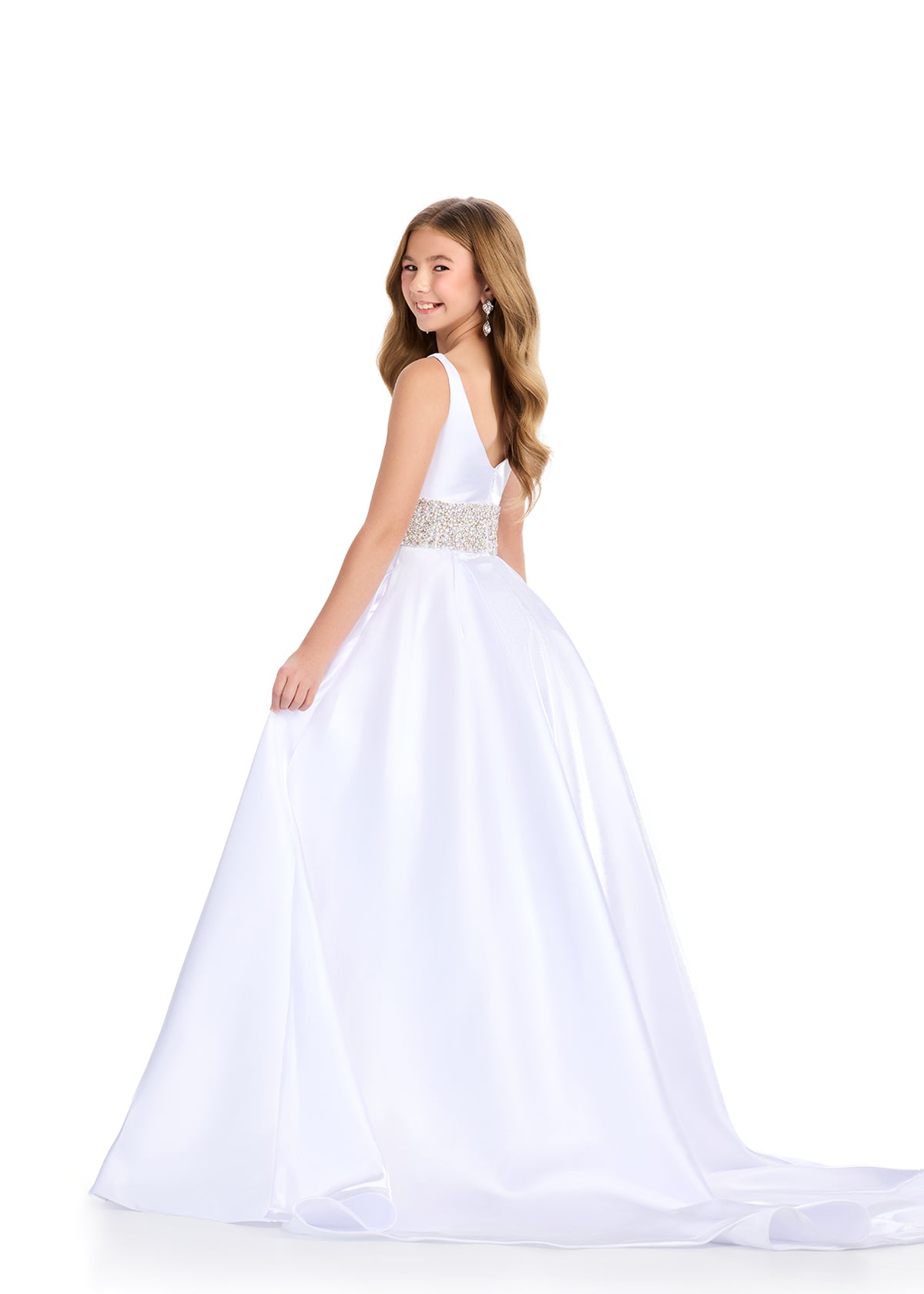 Indulge in luxury and sophistication with the Ashley Lauren 8276 Girls Satin Ballgown. This exquisite piece features a beautiful satin fabric that flows effortlessly, while the embellished crystal waistline adds a touch of glamour. Perfect for your little princess, this ballgown will make her feel like royalty.