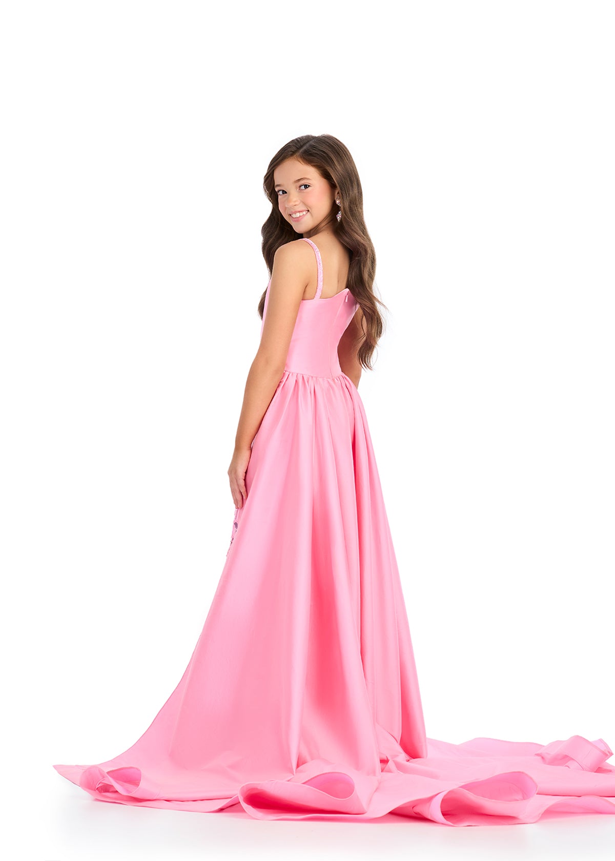 Elevate your little girl's style with the Ashley Lauren Kids 8287 Girls Pageant Jumpsuit. This fun and fashionable jumpsuit features intricate beading and a flowy overskirt for a glamorous look. Perfect for formal events, this jumpsuit will make your child feel confident and stylish. This taffeta jumpsuit is giving us all the glam! Featuring a one shoulder neckline and stunning beaded design, this look is complete with a sweeping train that takes our breath away!

One Shoulder
Fully Beaded Jumpsuit
Taffeta 