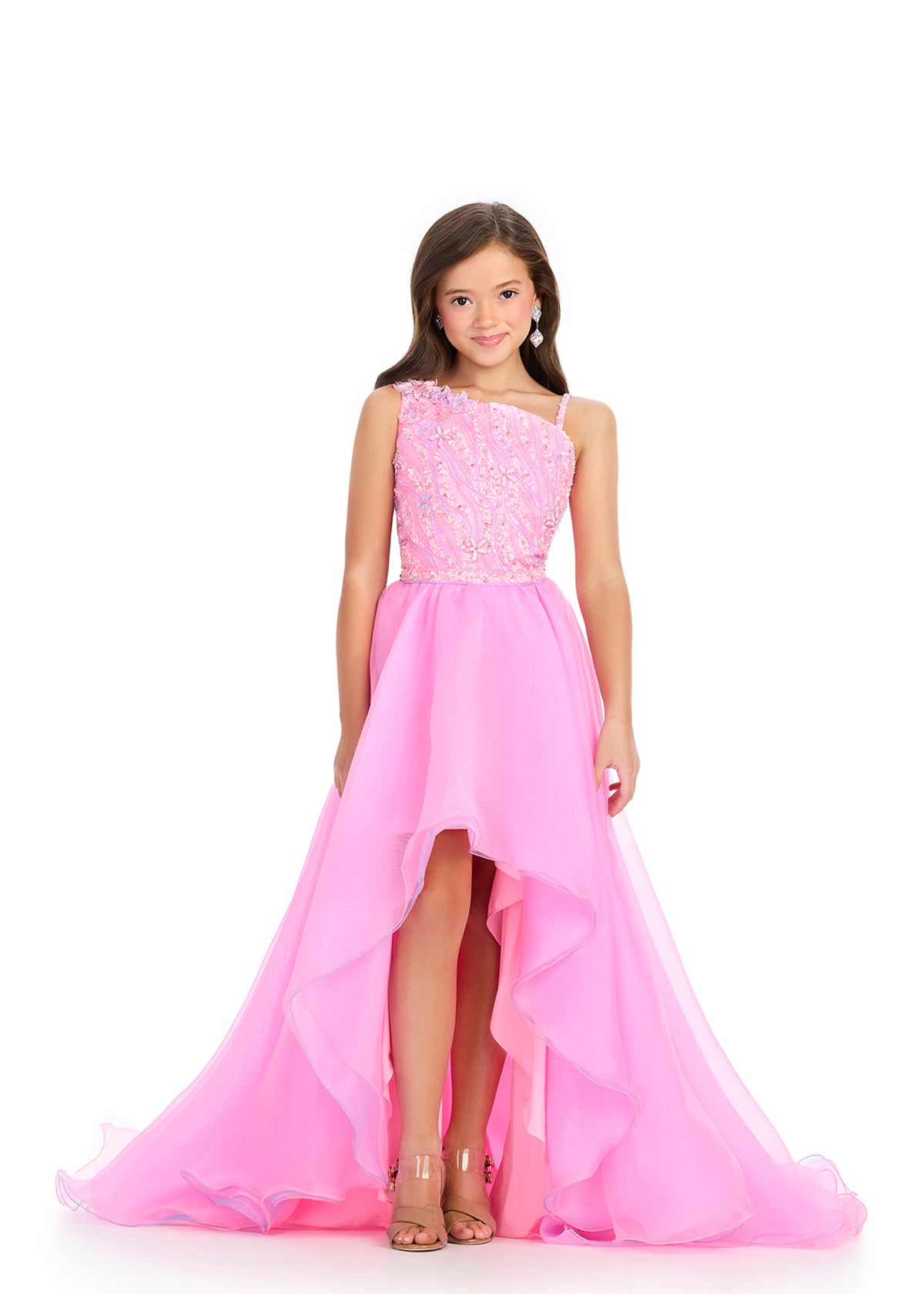 Elevate your little girl's pageant look with the stunning Ashley Lauren Kids 8290 dress. This one shoulder gown boasts intricate beading and a high low layered skirt for a touch of glamour. Perfect for pageants or any special occasion, this dress will make her feel like a true princess.&nbsp;Can you say fabulous? This gorgeous a-line gown features a one shoulder bustier with an intricate beaded design making way to a sweeping organza high low skirt, this dress is the definition of perfection!

One Shoulder 