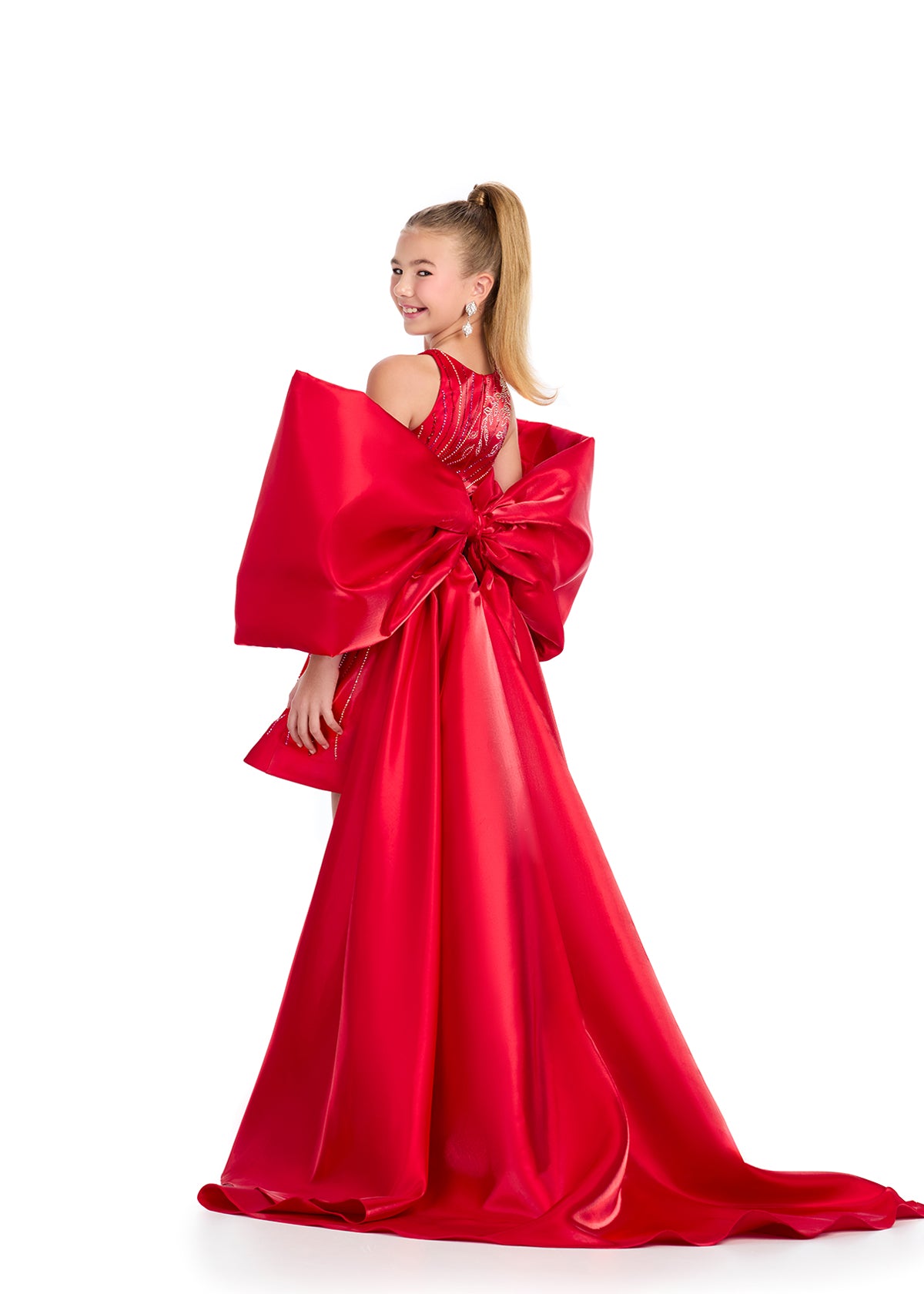 Introducing the Ashley Lauren Kids 8321 Oversize Bow Overskirt Pageant Accessory off the Shoulder Cape - the perfect addition to any pageant ensemble. The oversized bow and off the shoulder design add a touch of elegance and modernity to any outfit. Feel confident and glamorous on stage with this versatile accessory.&nbsp; Transform any outfit into a statement piece with this enchanting bow overskirt. This overskirt adds the perfect amount of glamour to any ASHLEYlauren cocktail dress, jumpsuit or dress.

B