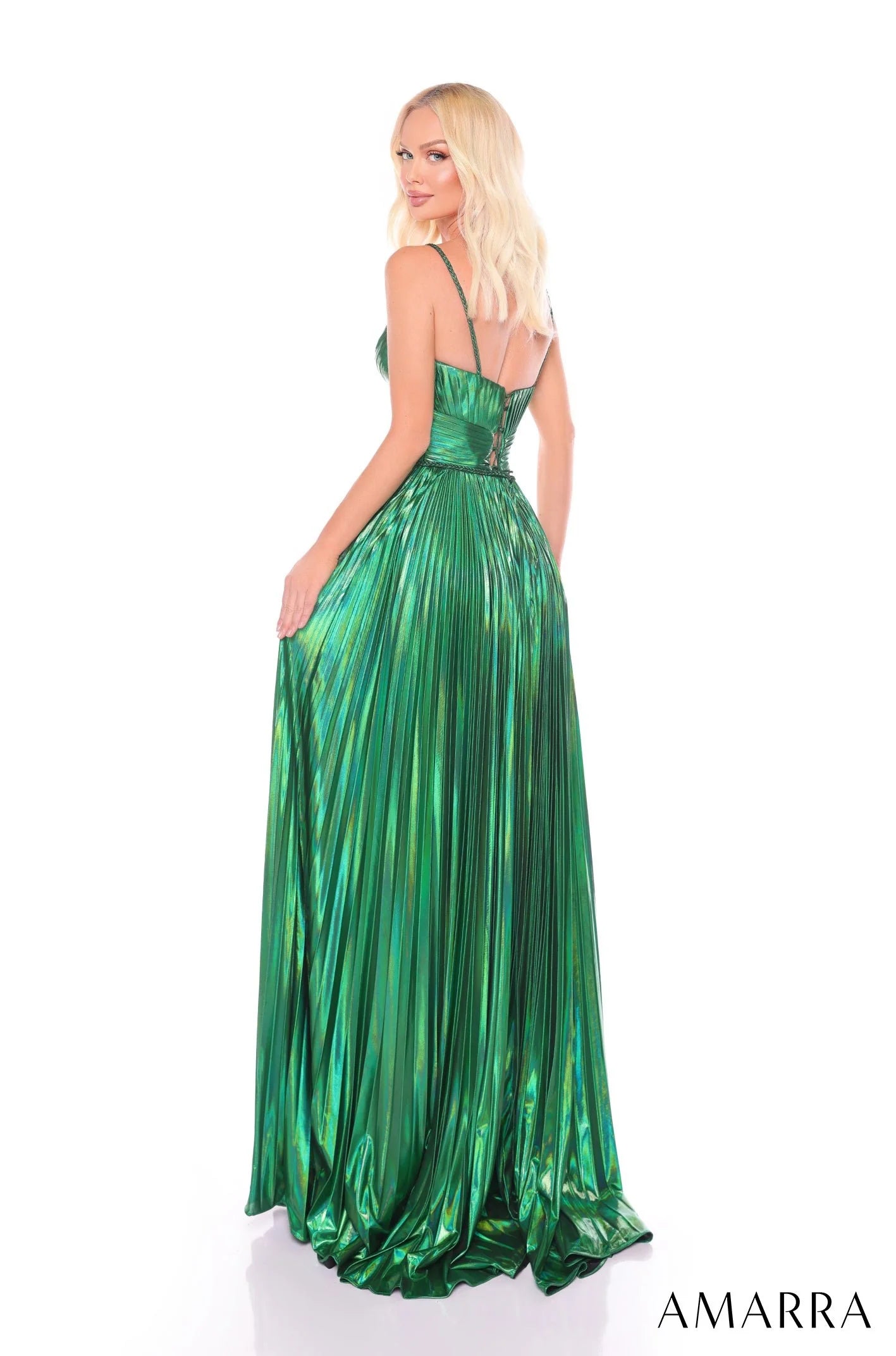 Indulge in luxury and sophistication with the Amarra 88096 Long Metallic Pleated Prom Dress. Adorned with a stunning V-neckline and a corset designed to enhance your figure, this elegant maxi dress will make you feel like a work of art. Its metallic pleated fabric and thigh-high slit add a touch of glamour to any formal evening event.