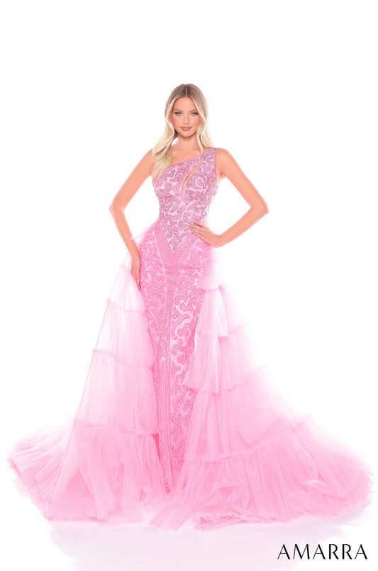 Introducing the Amarra 88147 Beaded One Shoulder Pageant Dress. With intricate beading and a tiered overskirt, this formal gown exudes elegance and sophistication. The crystal detailing adds a touch of sparkle, making you stand out at any event. Elegant tiered tulle gown with intricate crystals and sequin, and a flattering one shoulder neckline. 